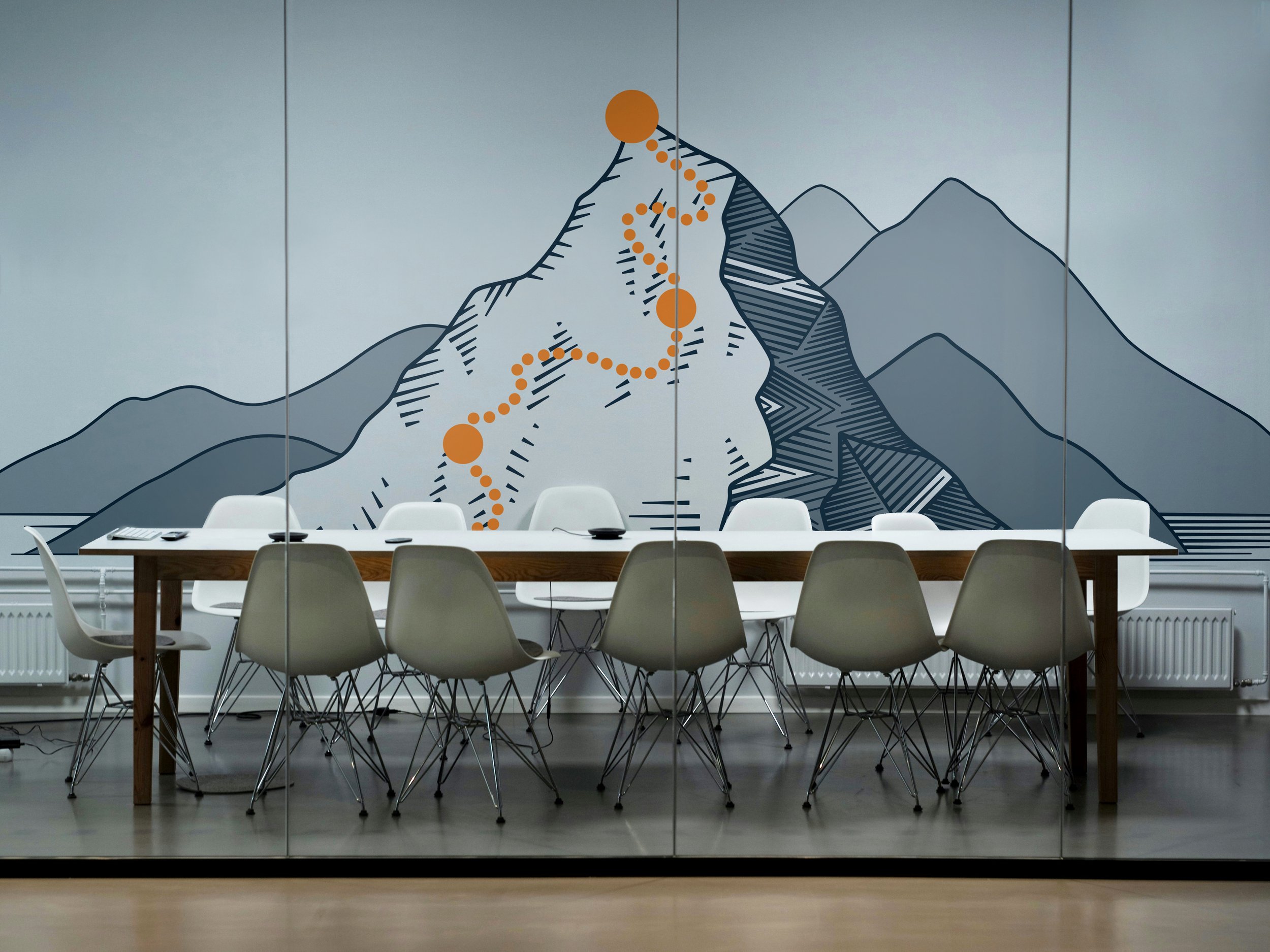 The DPR Mission Mountain on a conference room wall