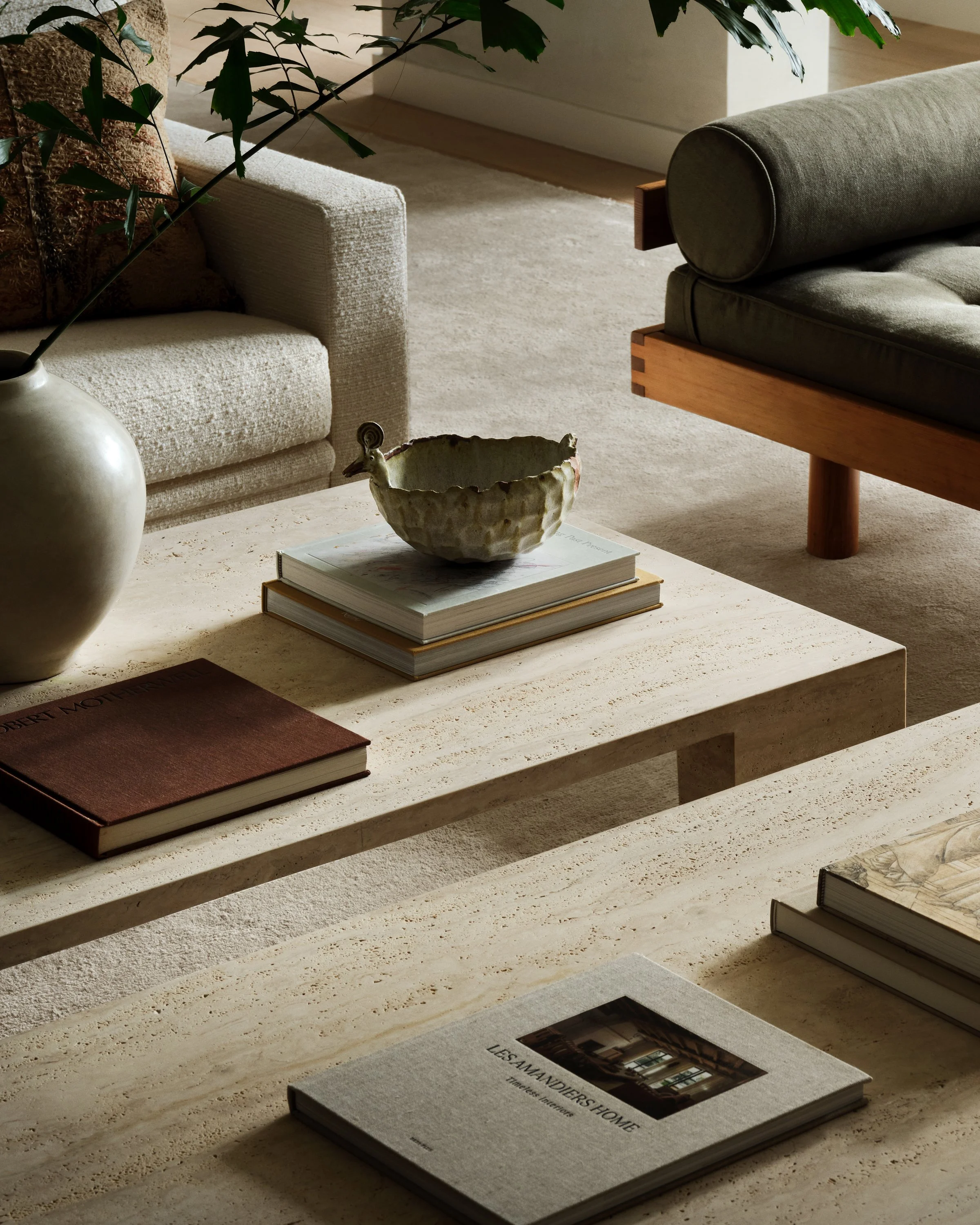 Closeup of coffee table arrangement from the Cocoplum Residence I project.