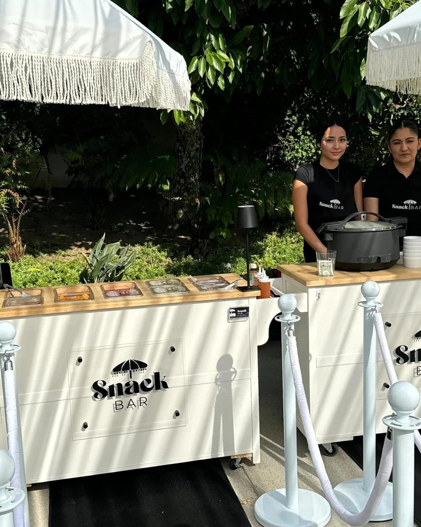 Dream snack bar for your celebration today! 

Picture this: a beautiful outdoor event, happy guests, and two smiling hosts behind our signature Snack Bar setup. Our clients wanted a seamless, delicious experience&mdash;and their smiles say it all.

R