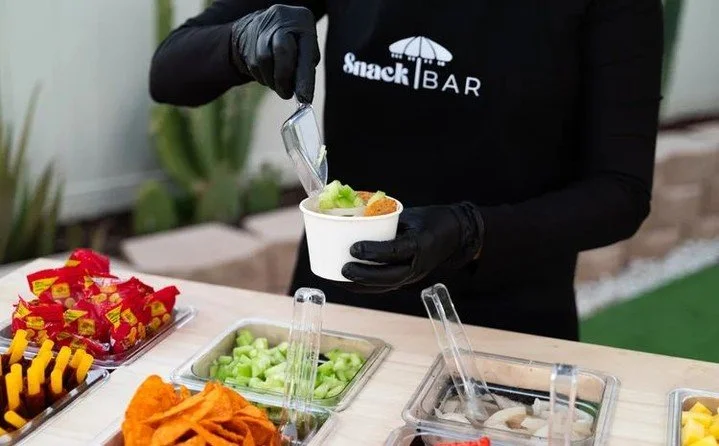 Ever wonder how your snack bar magic happens? Peek behind the scenes with our team in action. Every detail, every sprinkle, handled with care. Your celebration deserves this level of love. Book your event now and taste the difference! 🎉✨