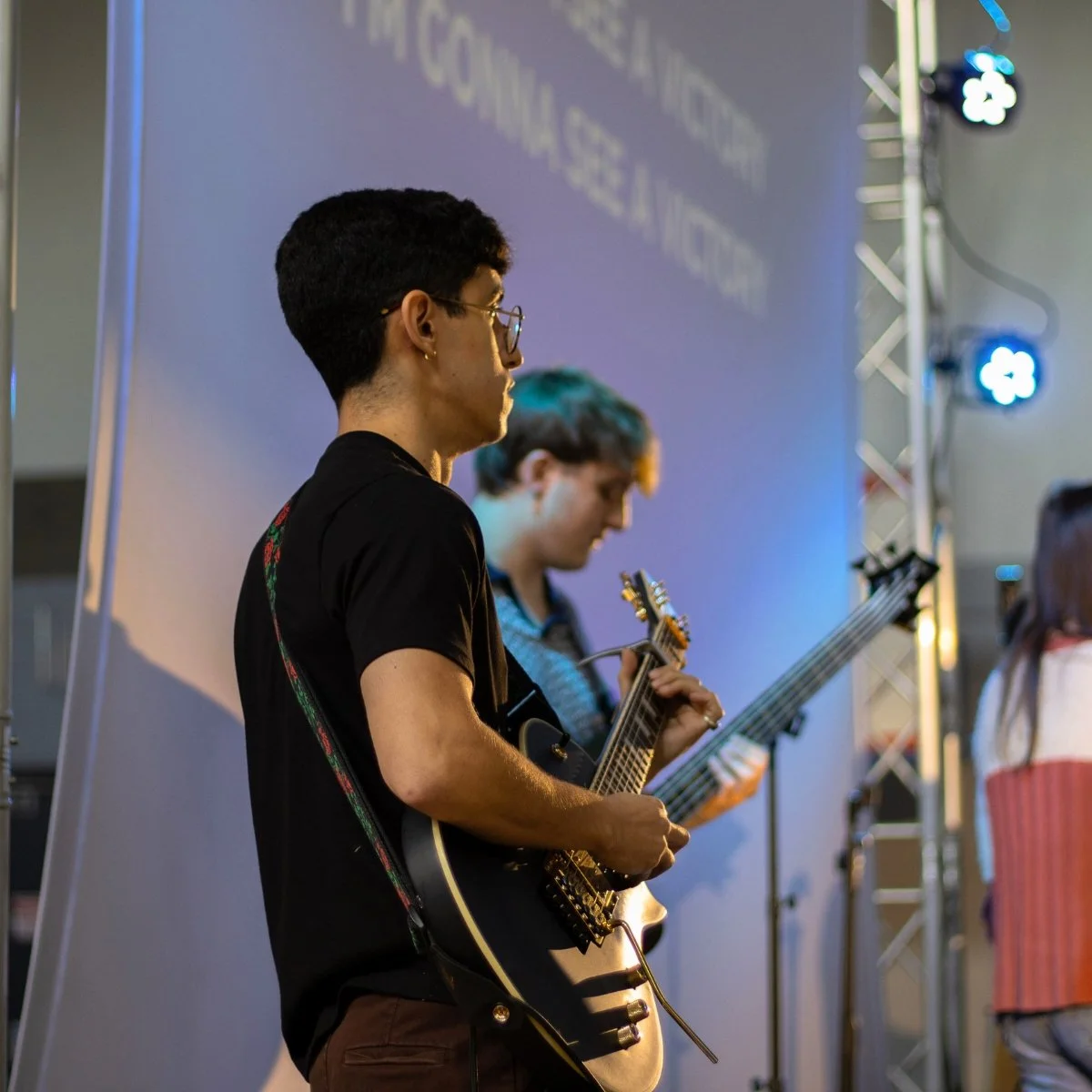 Musicians leading worship during Sunday service at Restore Houston Church