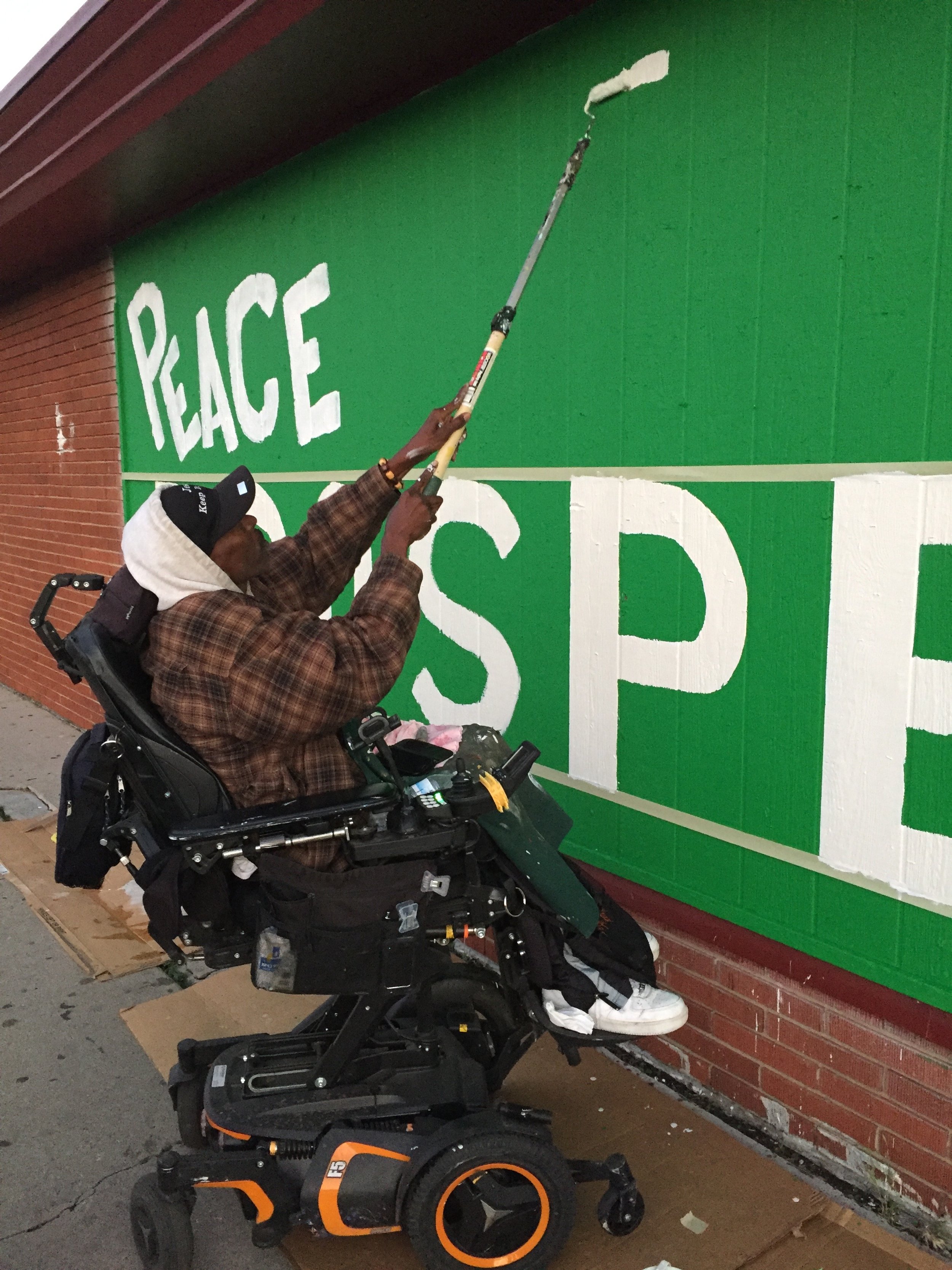 A community leader and business owner, this resident designed the mural as a language of positive affirmations for the neighborhood, and as a way to re-claim a "dead" space visible from the elementary school.