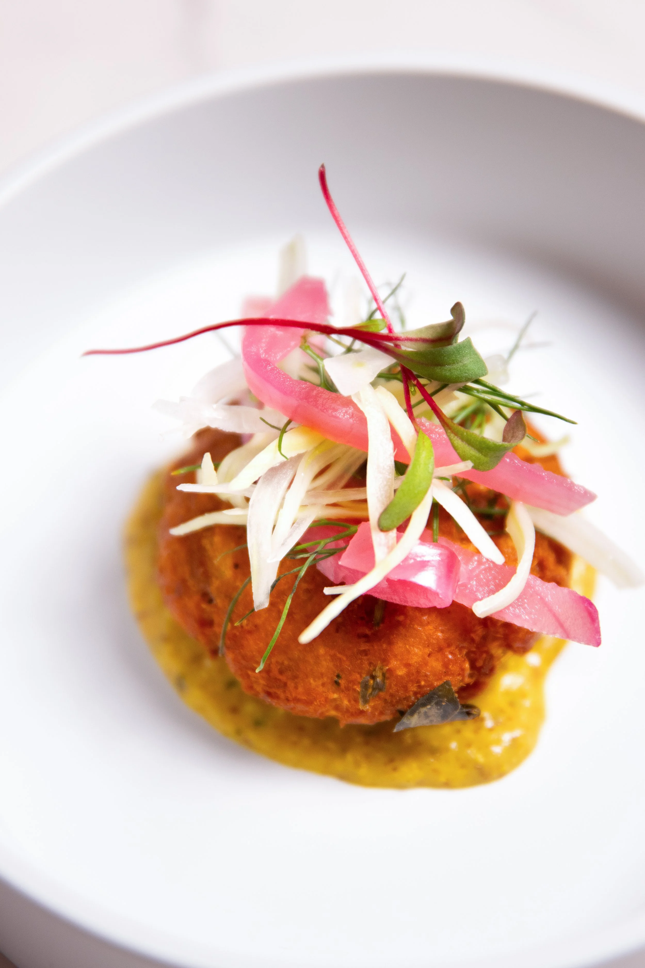 South indian crab cake with pickled onions