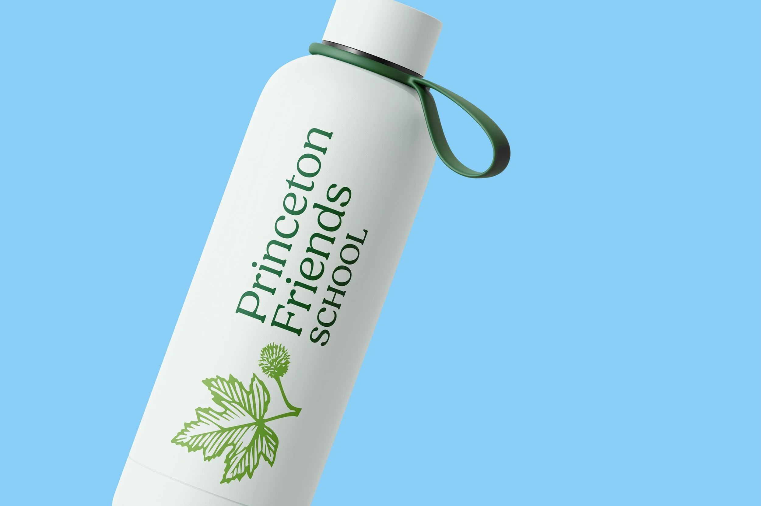 White water bottle against a medium blue background. Princeton Friends School logo with leaf, seed and typography is on the bottle.