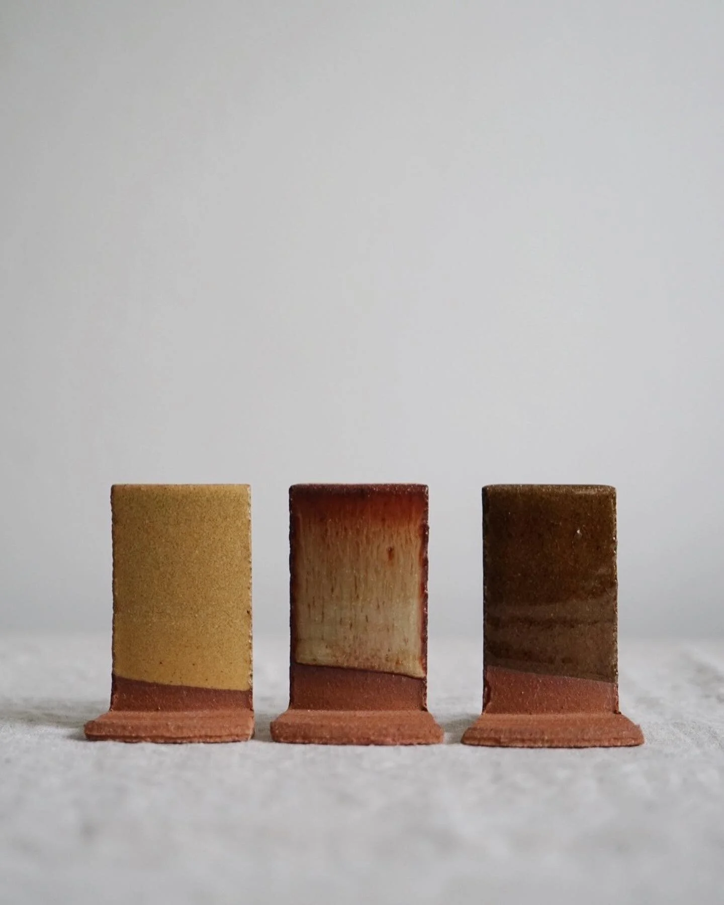 Some of the glaze test tiles I made.

Slide 1: Ochre, Brown, Golden Green
Slide 2: Satin White, Oatmeal, Silk Black

Testing is an important part of pottery but also soooo very time consuming. 

To simplify my process and limit the materials I use, I