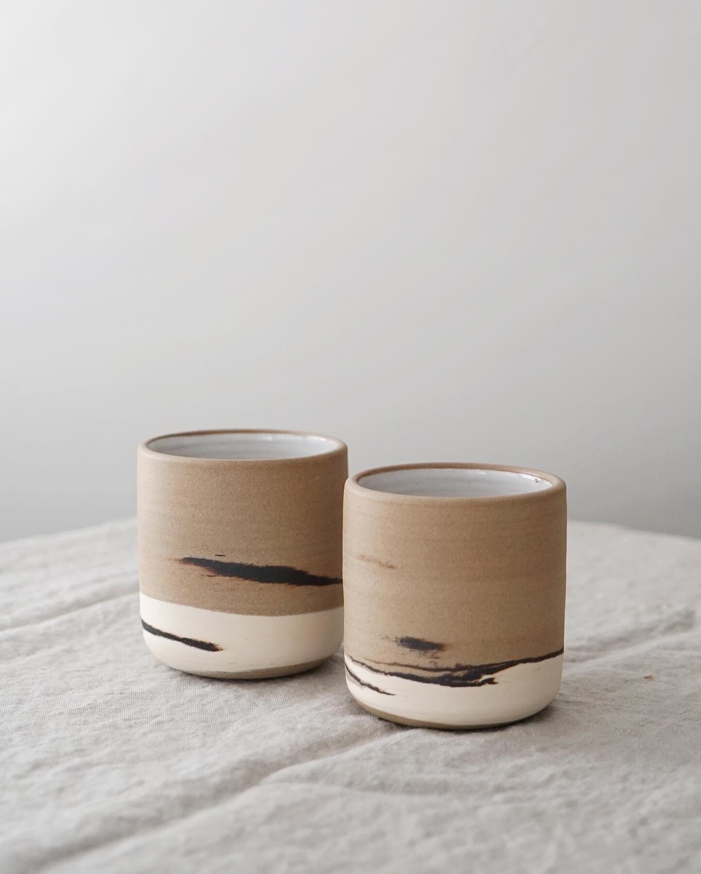 Marbled forms created using three different types of clay. For these pieces, the inside is glazed white, while the outside is left raw, showcasing the marbled effect.

Working with more than one type of clay at a time can be tricky because each clay 