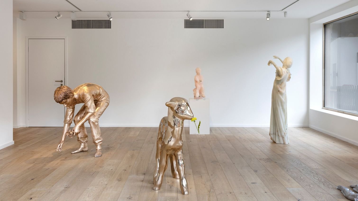 Geometric drawing of an outline square with sections divided by vertical, horizontal, and diagonal lines.