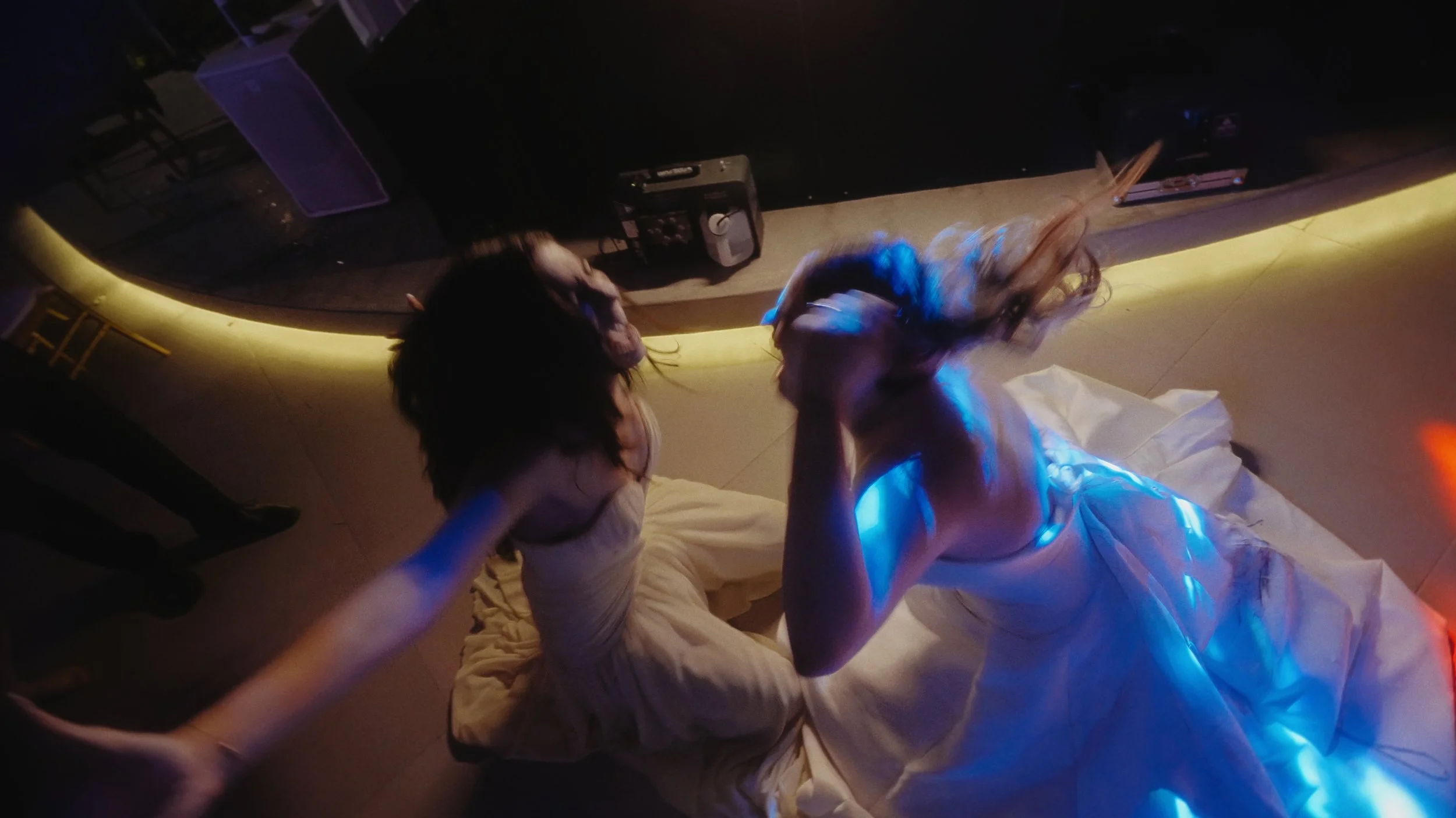 Bride dancing on the floor with a friend beside the DJ booth at Ktima Xristalogianni Avdellero Larnaca, Red Lens Films