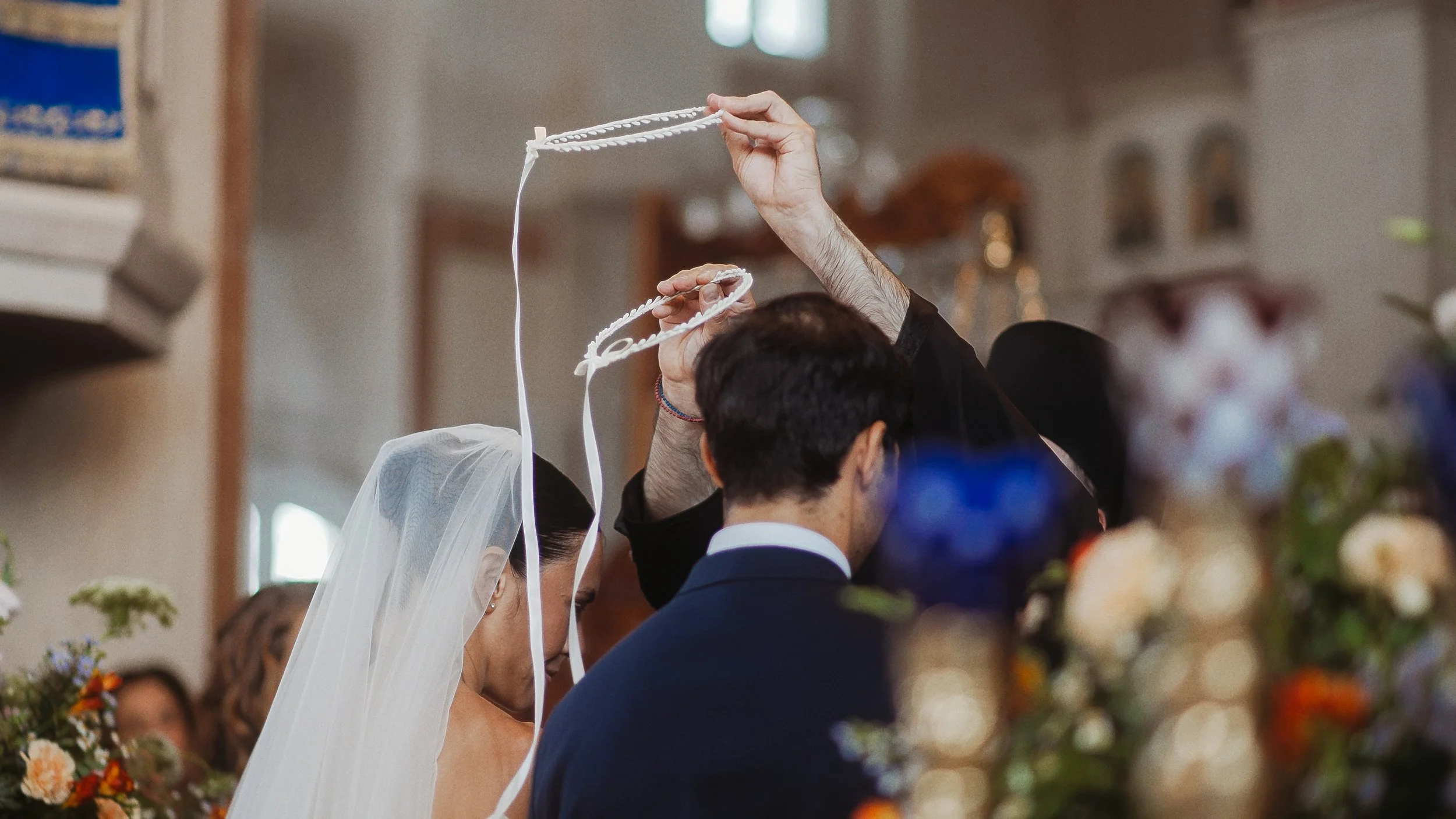 Stefana wedding crowns being placed during Greek Orthodox ceremony, Nicosia Cyprus, Red Lens Films