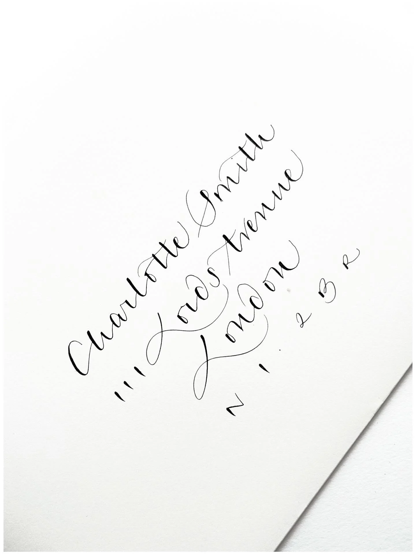 Pared back modern calligraphy font - perfect if you want a less whimsical look - smart, neat and stylish. Set the tone when your invitations land 💌