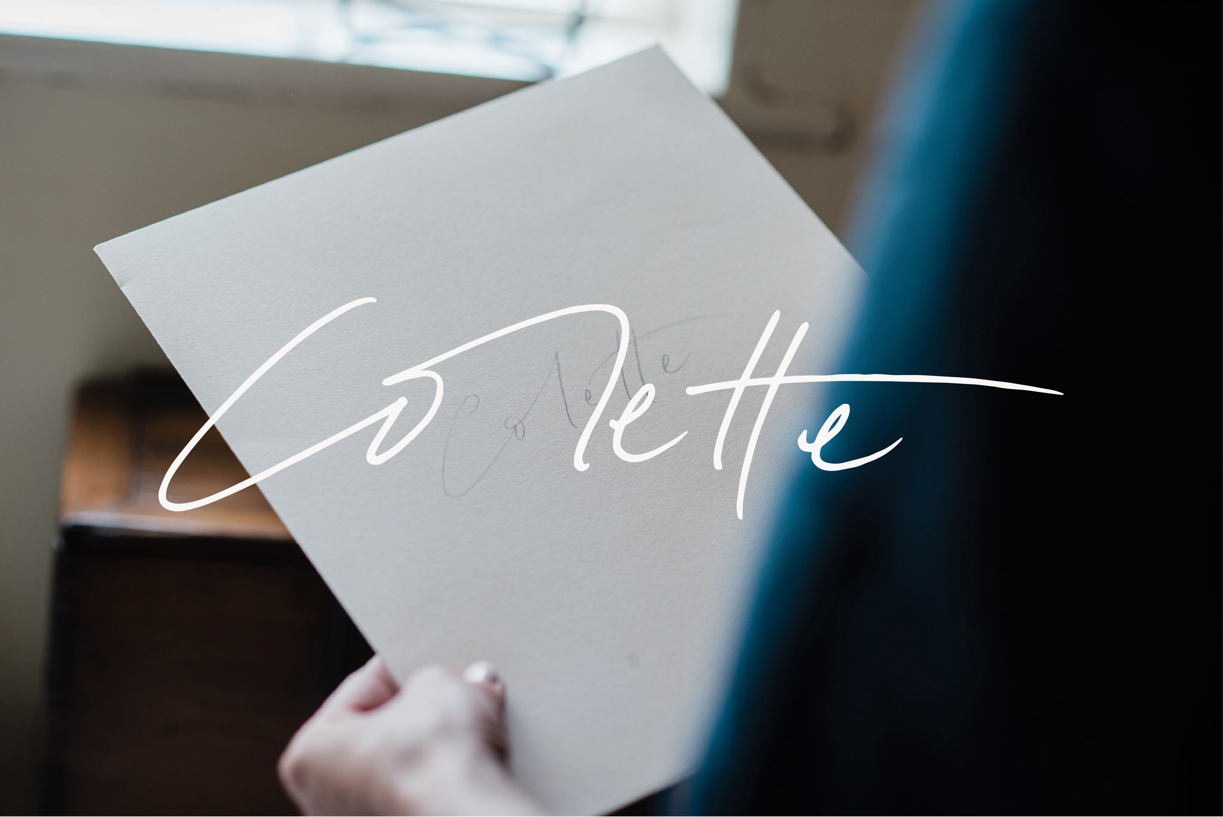 Colette handwritten and overlaid over image of lady holding a piece of white card which reads the same