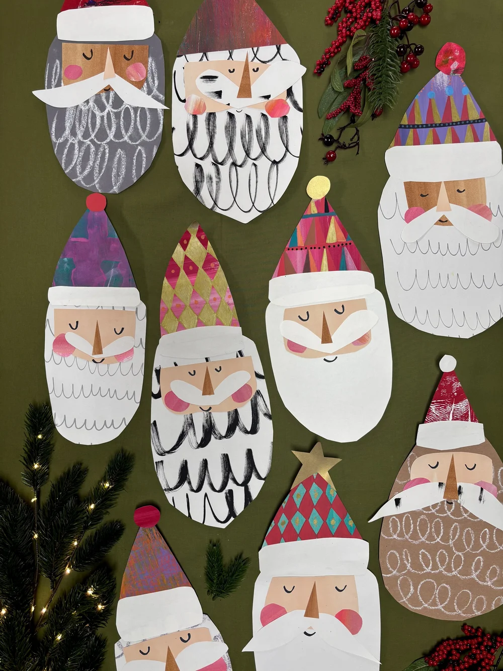 A wall of children's collage Santa faces