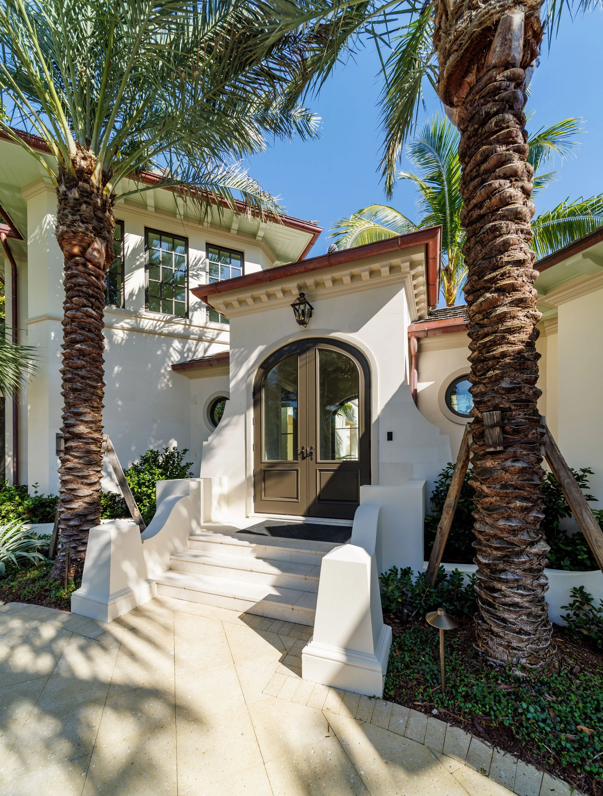 Charming entry to this luxurious, Bermuda-inspired home.