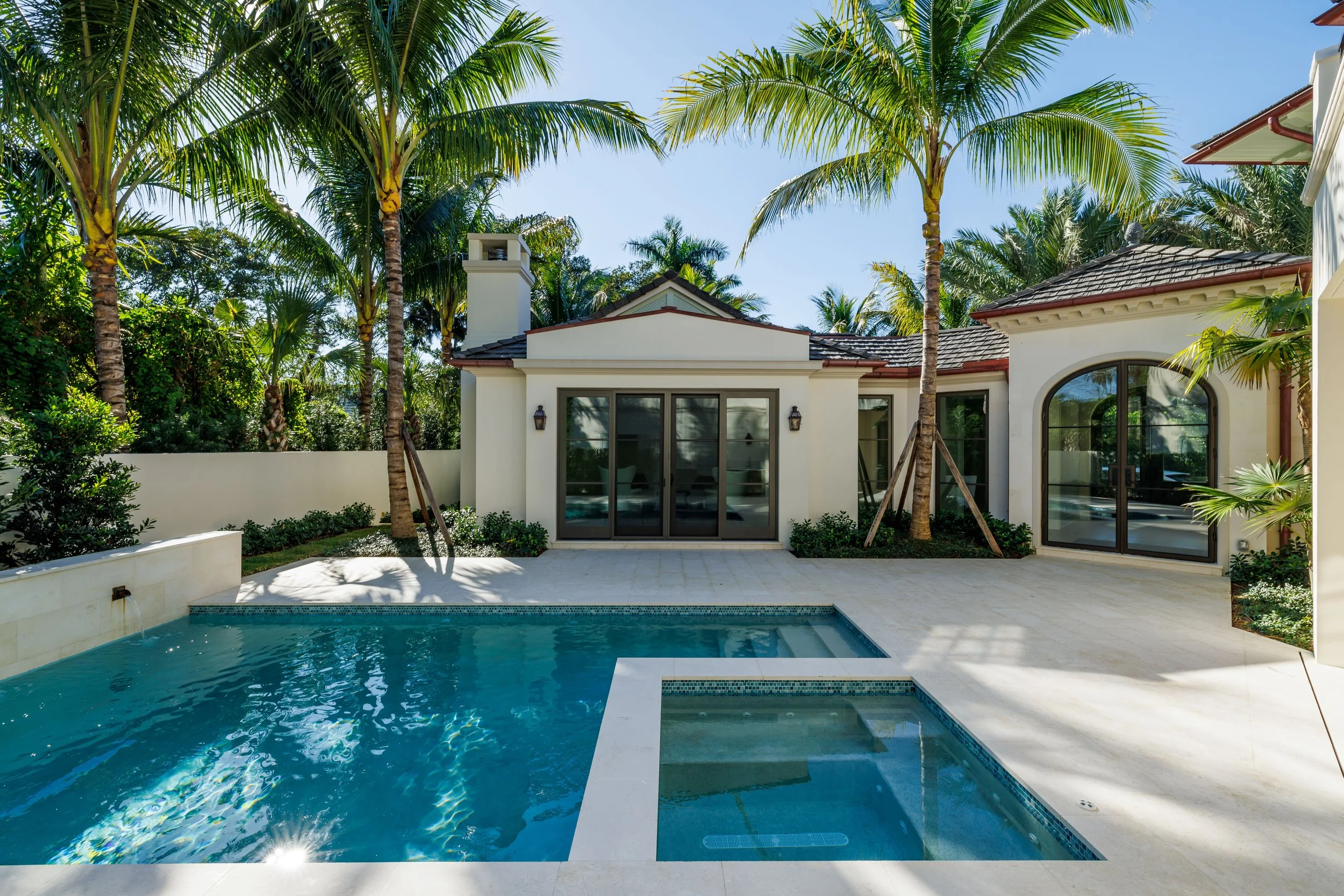 Ample pool and spa area in courtyard