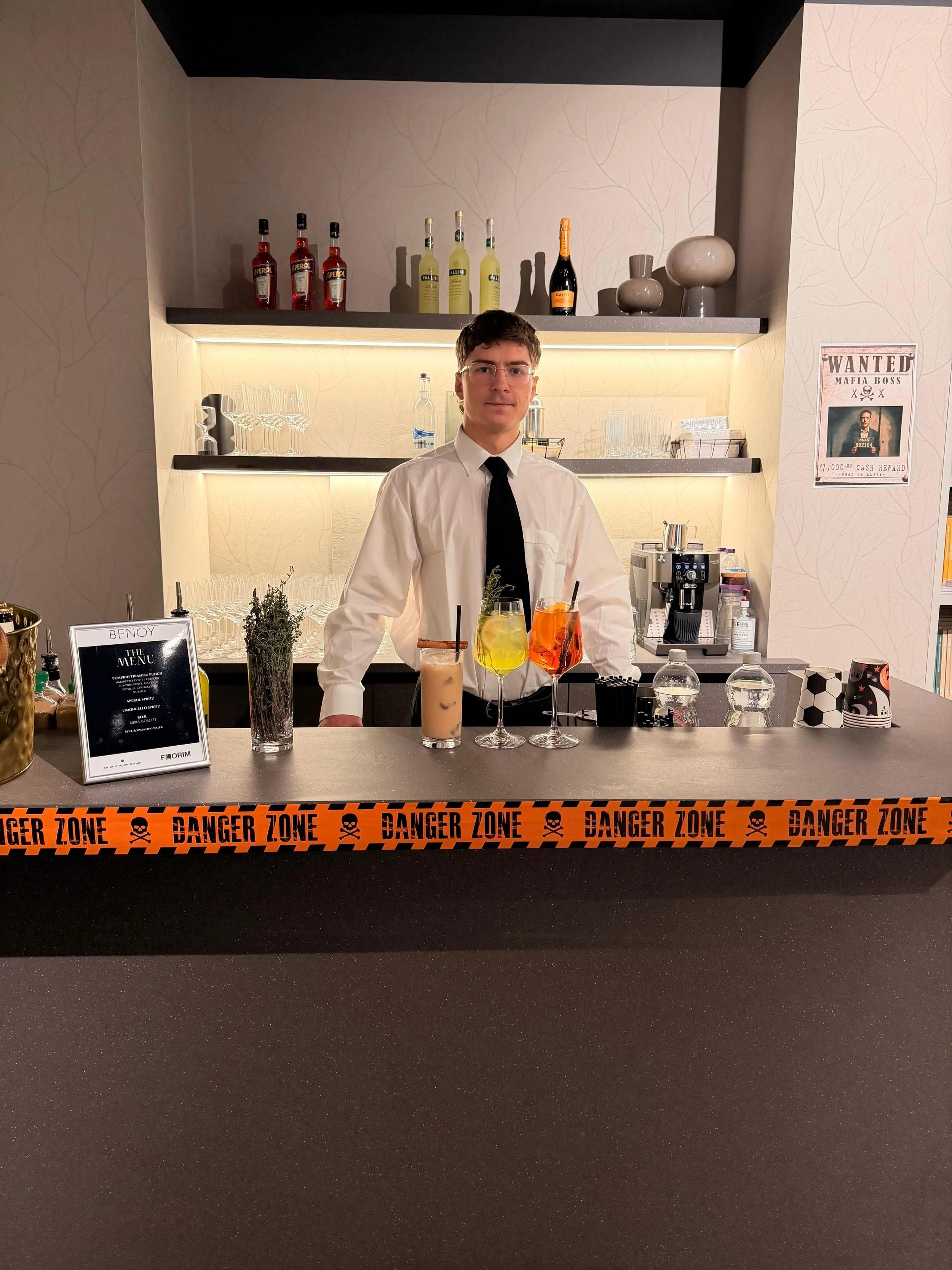 Stylish corporate Halloween party with professional mixologist and elegant seasonal cocktail bar in London.