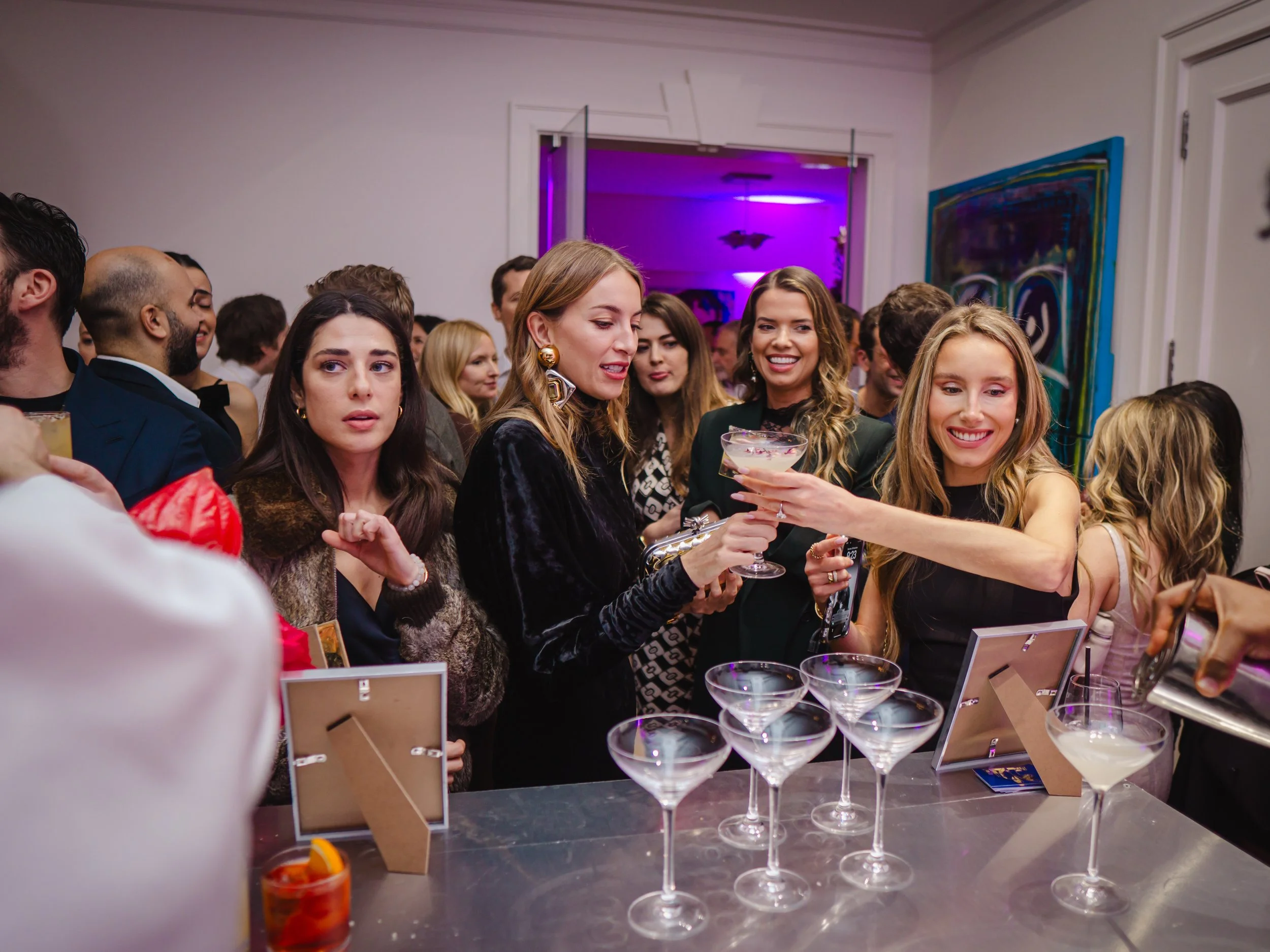 Hire a mixologist London creating personalised cocktail experience for guests.