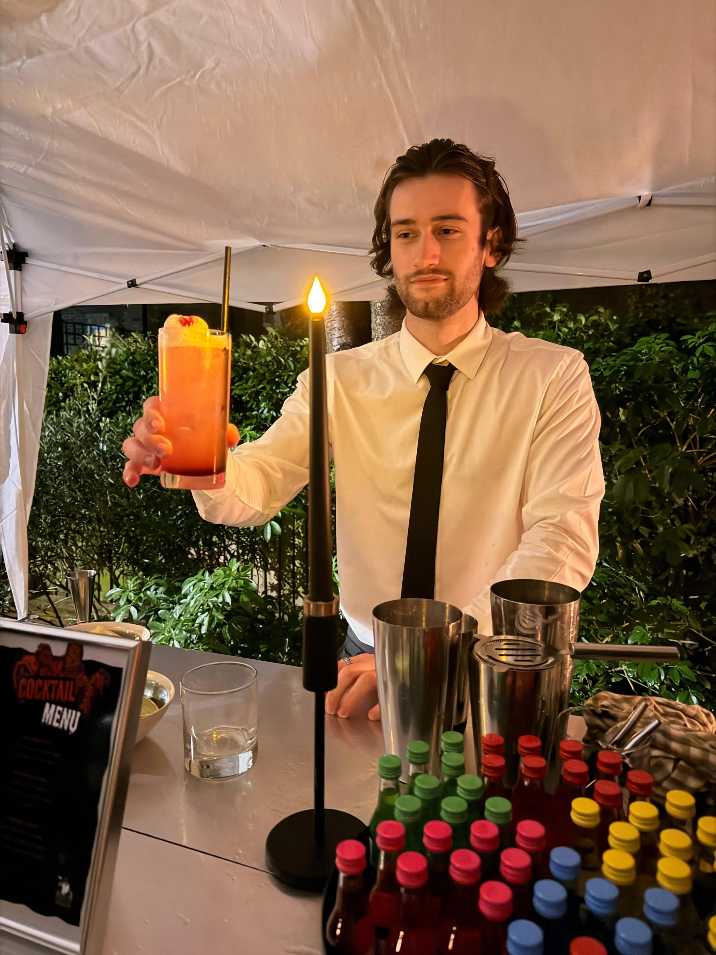 Corporate Halloween party with sophisticated lighting and subtle seasonal décor in a London office.