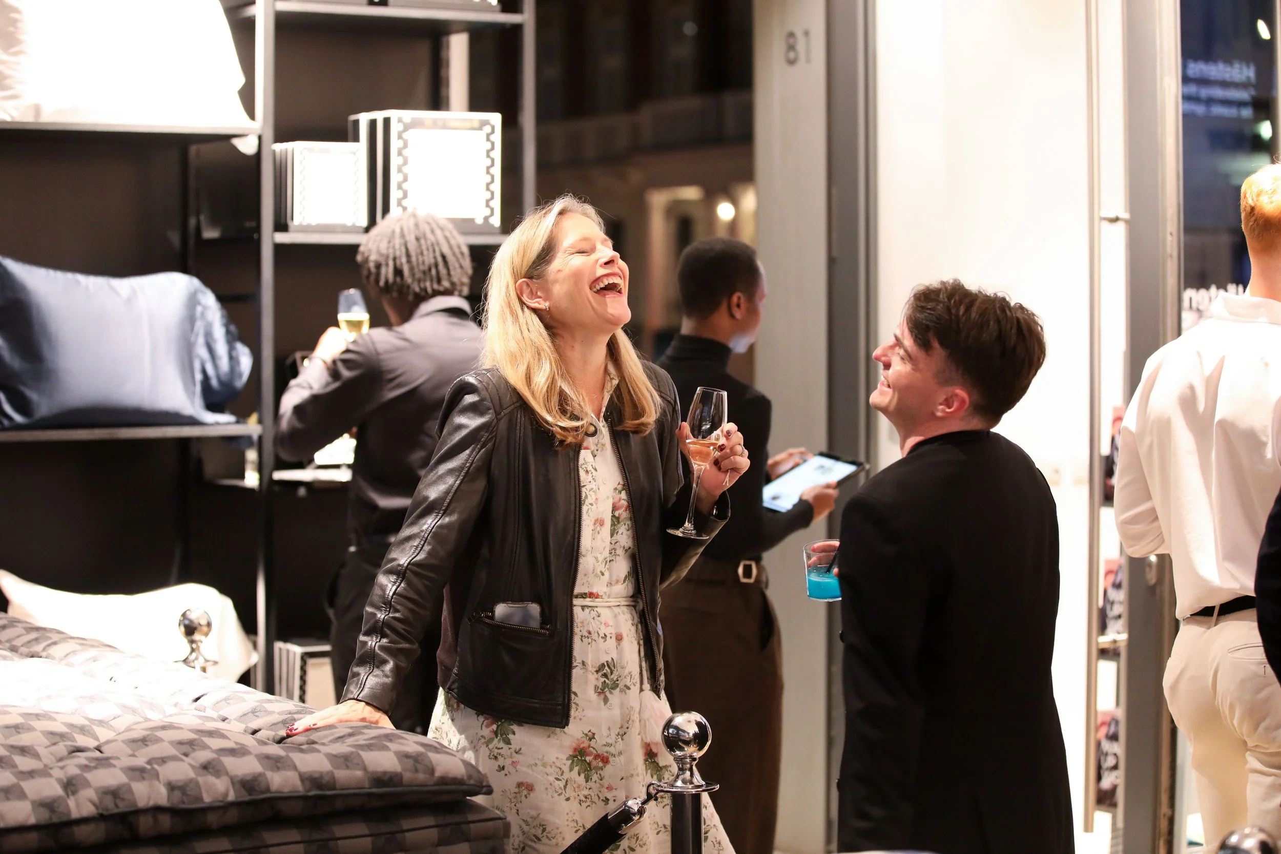 Guests enjoying bespoke cocktails during relaxed post-event networking session.