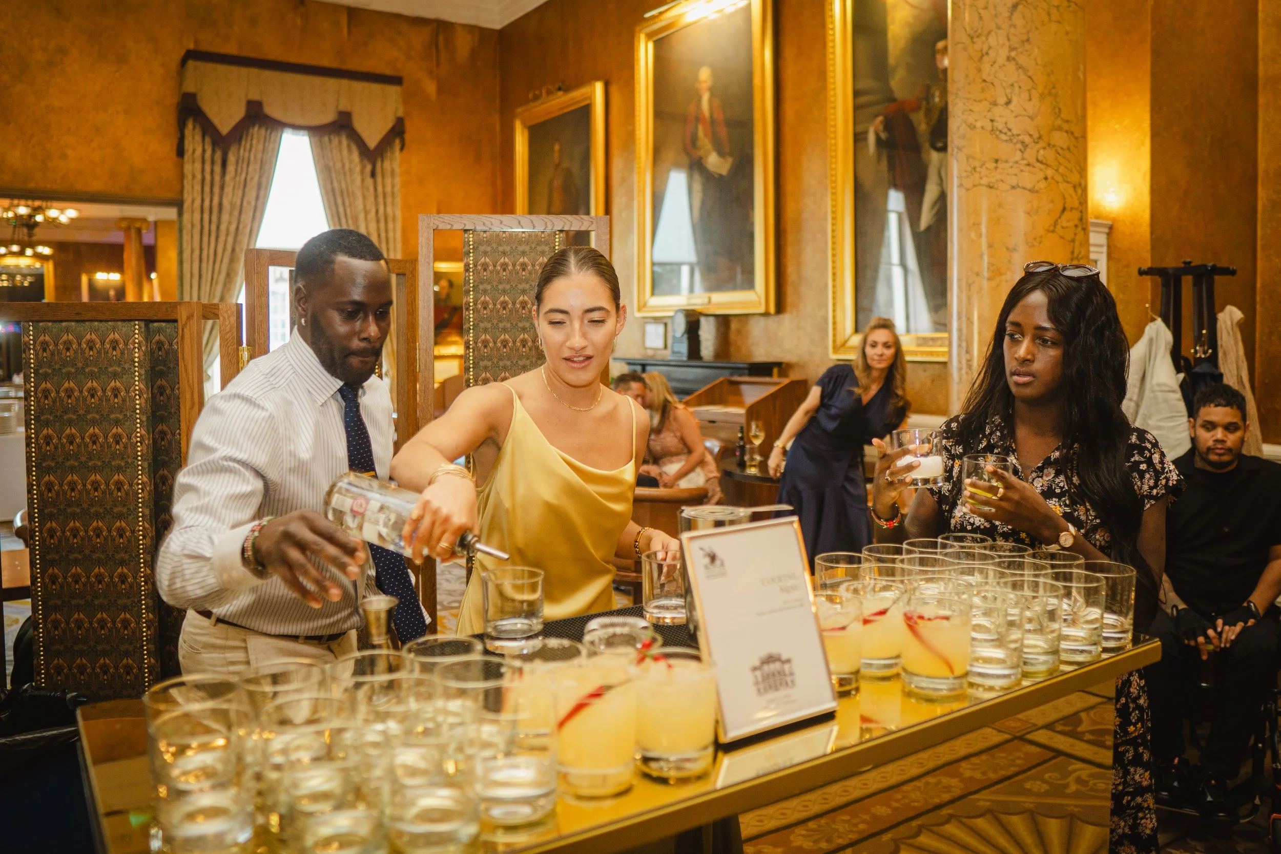 Wedding cocktail bar hire London creating elegant social atmosphere at luxury reception.