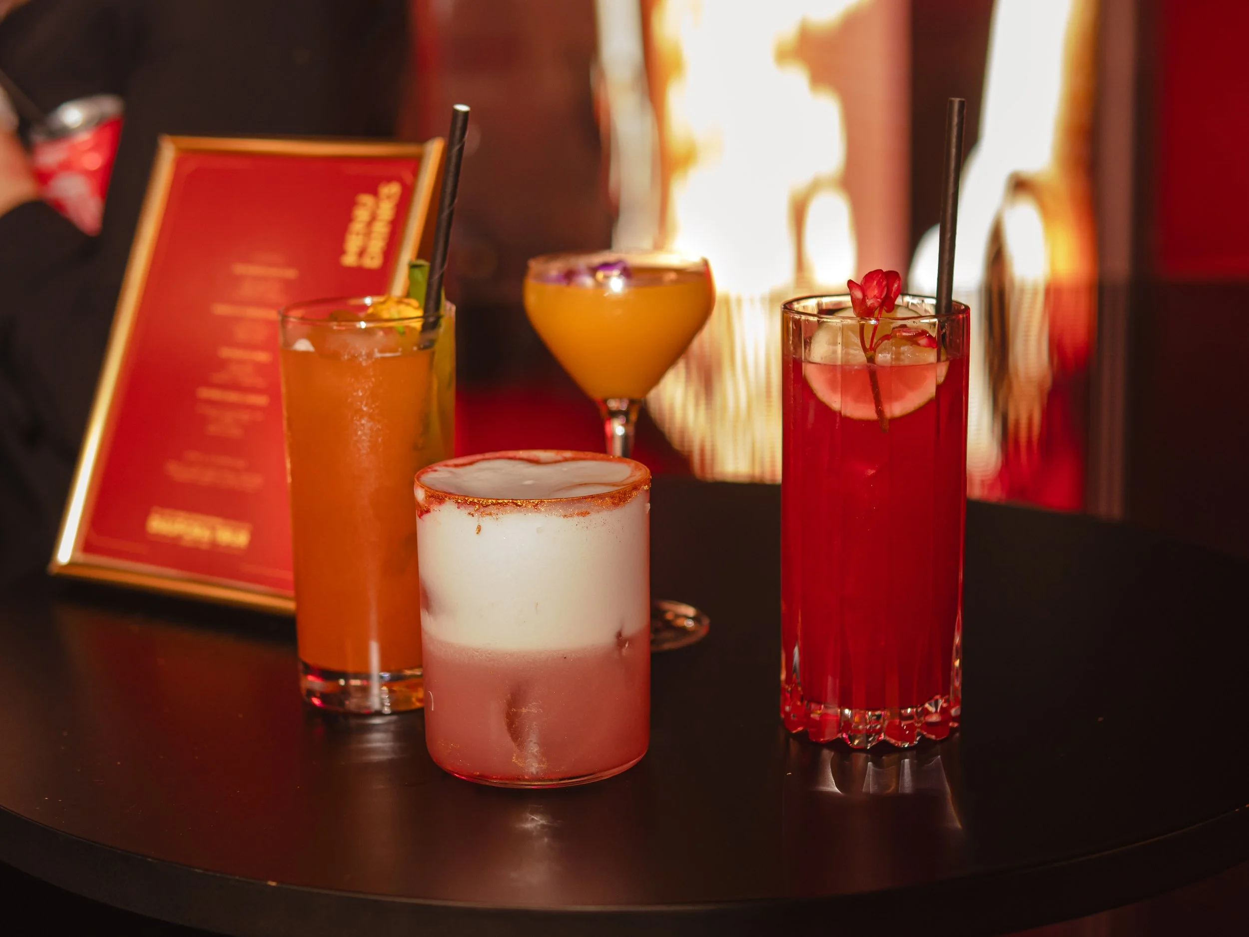 Corporate mixologist crafting premium cocktail at corporate event in London.