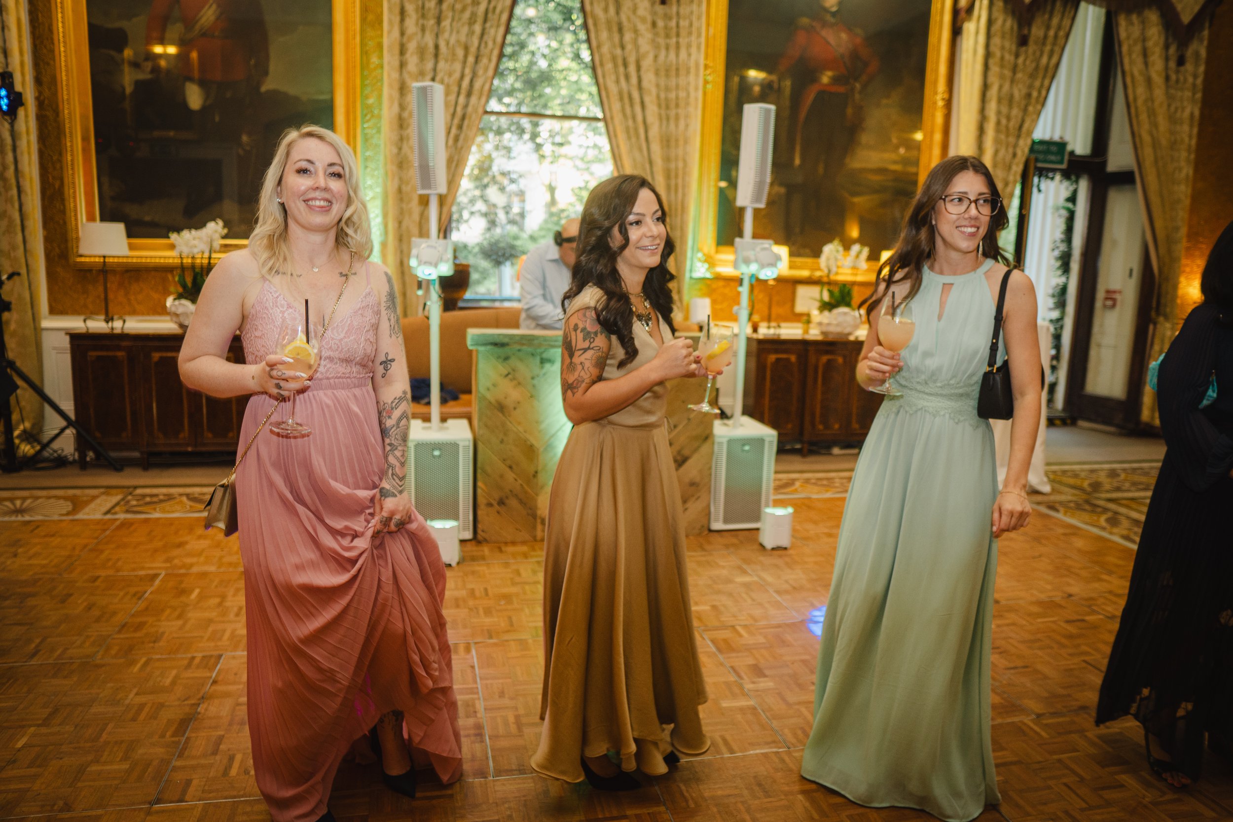 Cocktail bar hire for weddings helping guests relax during a London wedding reception.