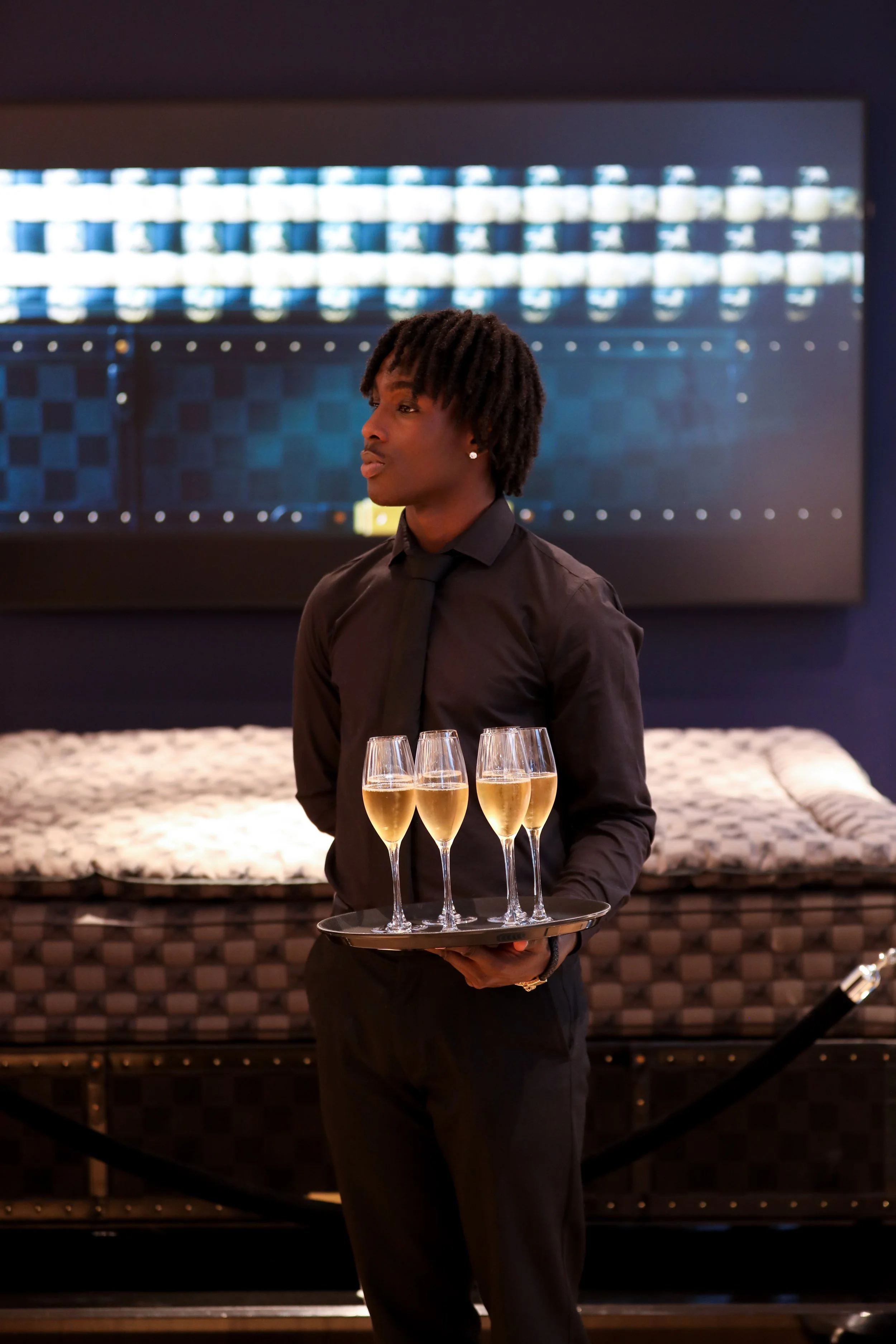 Corporate mixologist enhancing guest experience through premium hospitality.