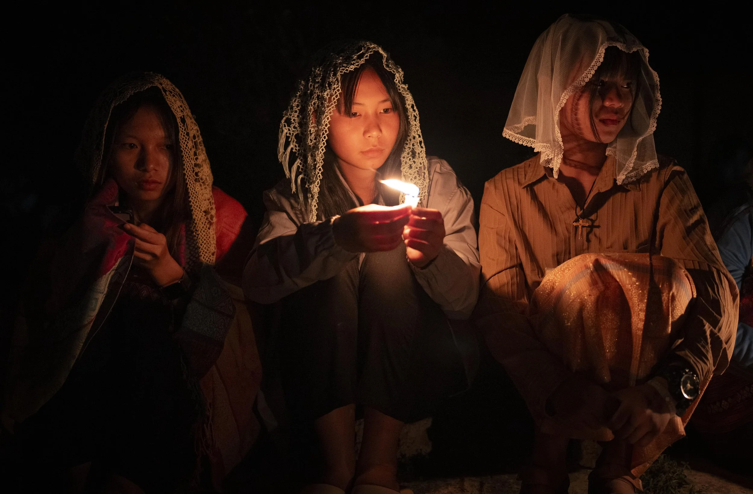 Refugees find solace during Easter Mass at church. Myanmar, 2025