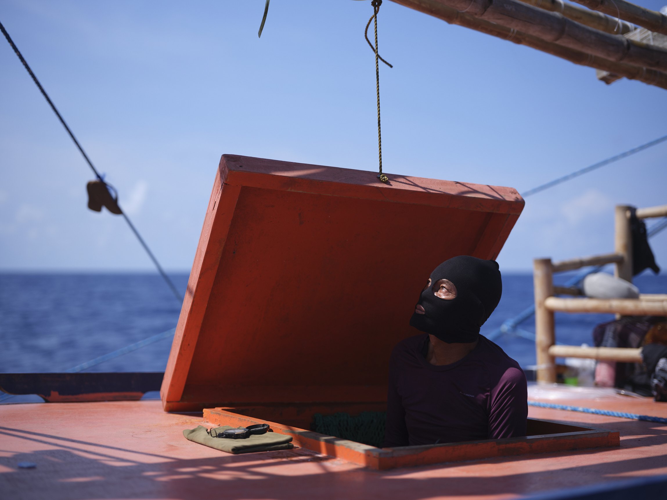 Filipino fisherman at Scarborough Shoal. Chinese-occupied territory, South China Sea, 2024