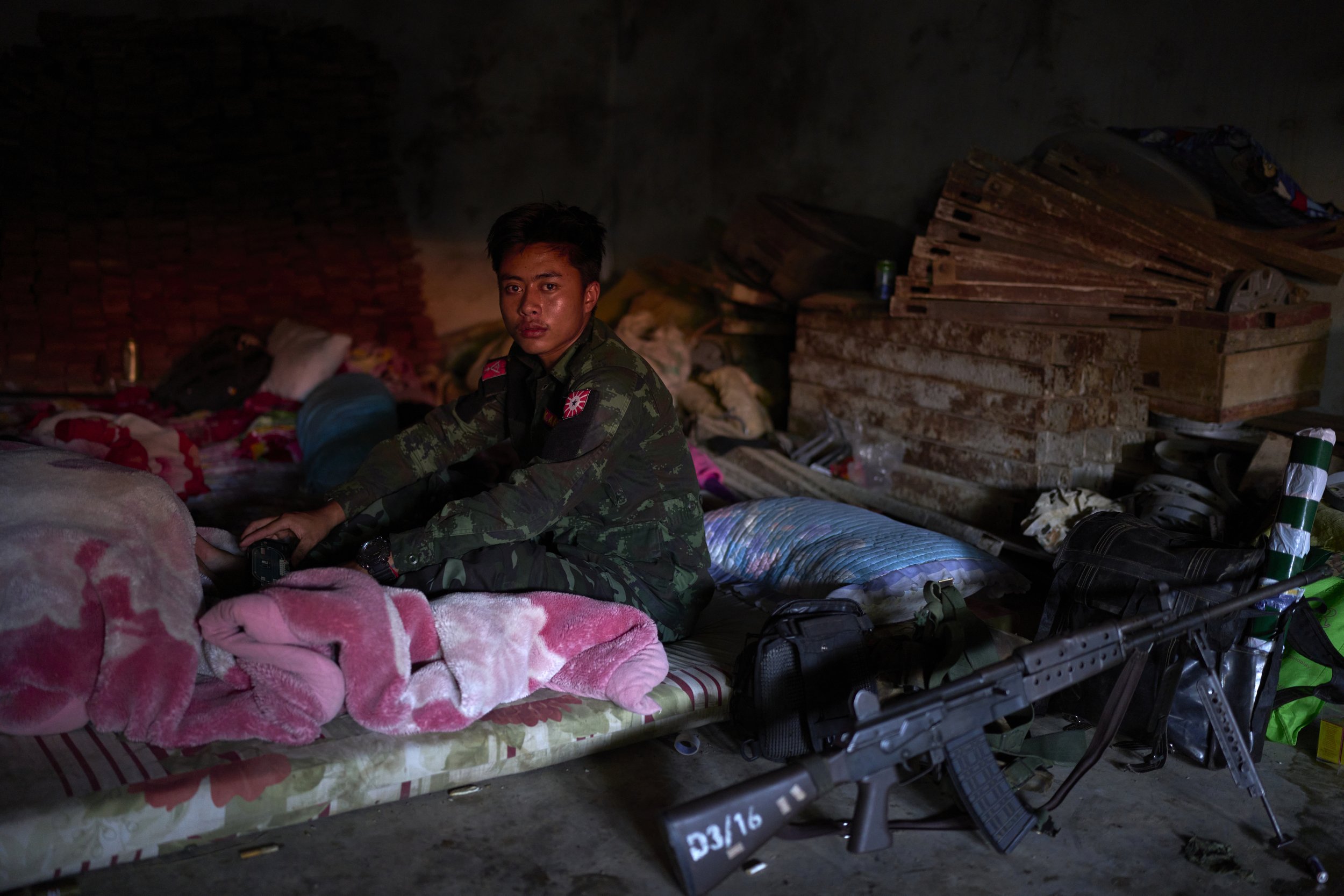 Sick Karenni fighter on the front line. Loikaw, Myanmar 2023
