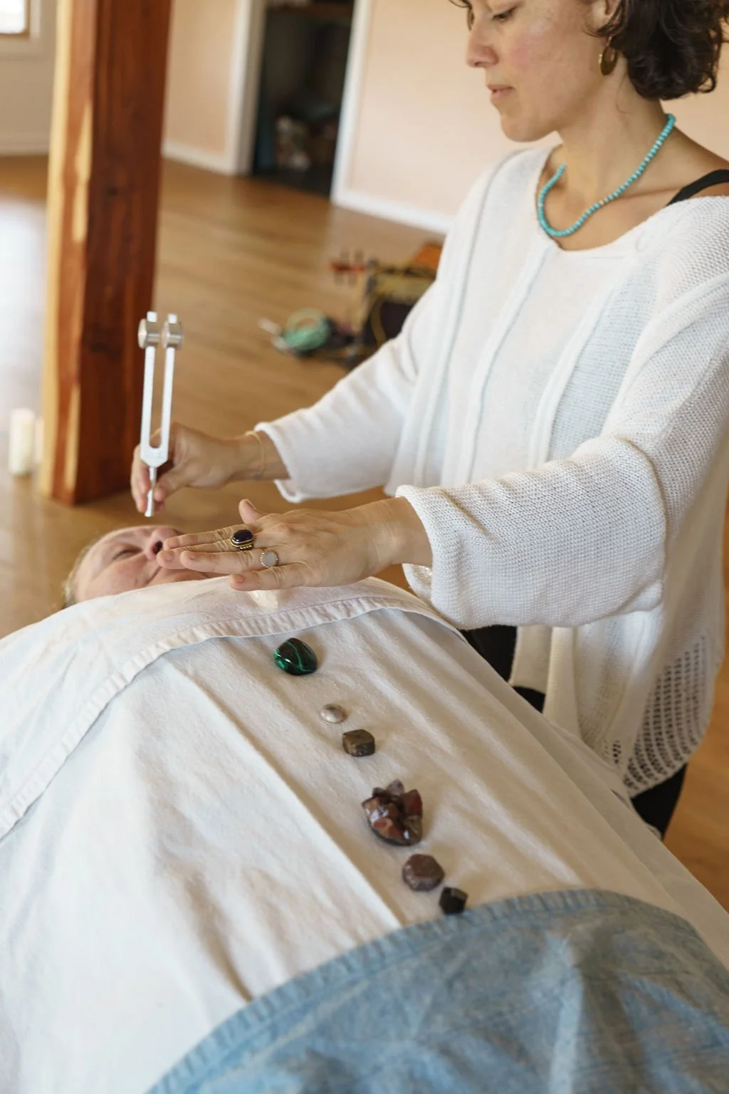 Hands-on energy healing on the treatment table