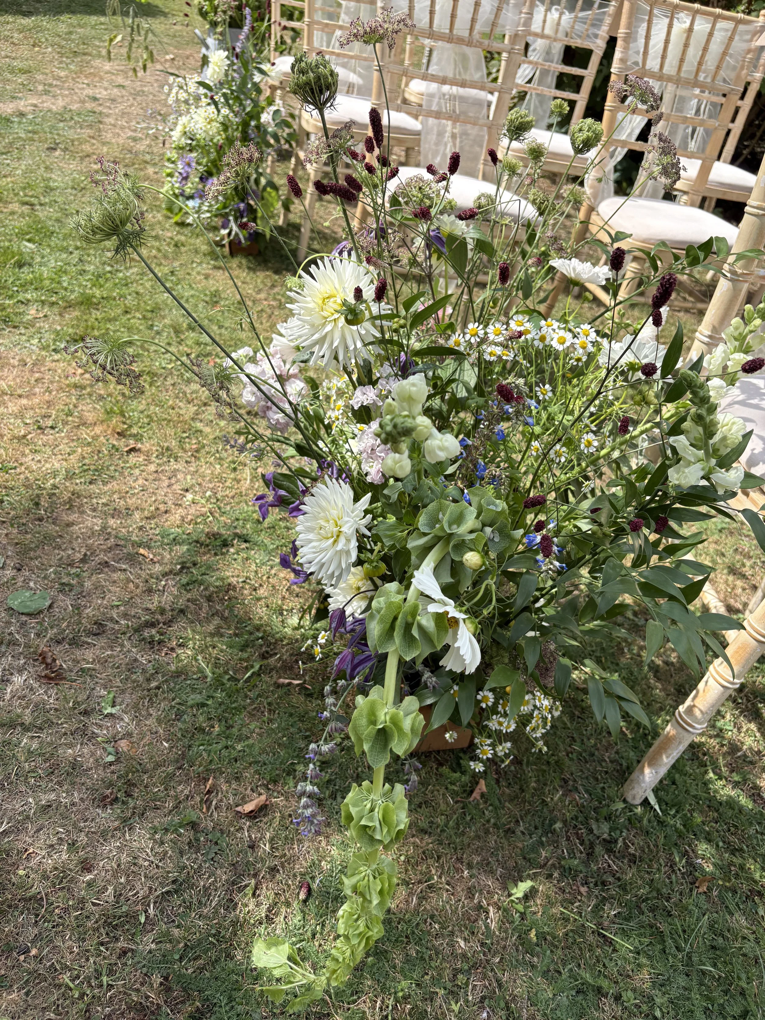 Flower meadow wedding aisle