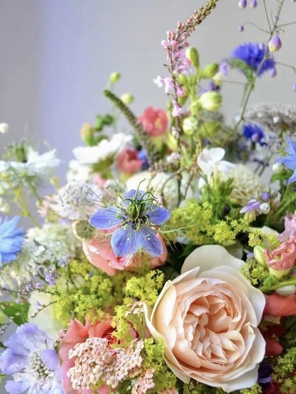 early summer blue and pink bride bouquet