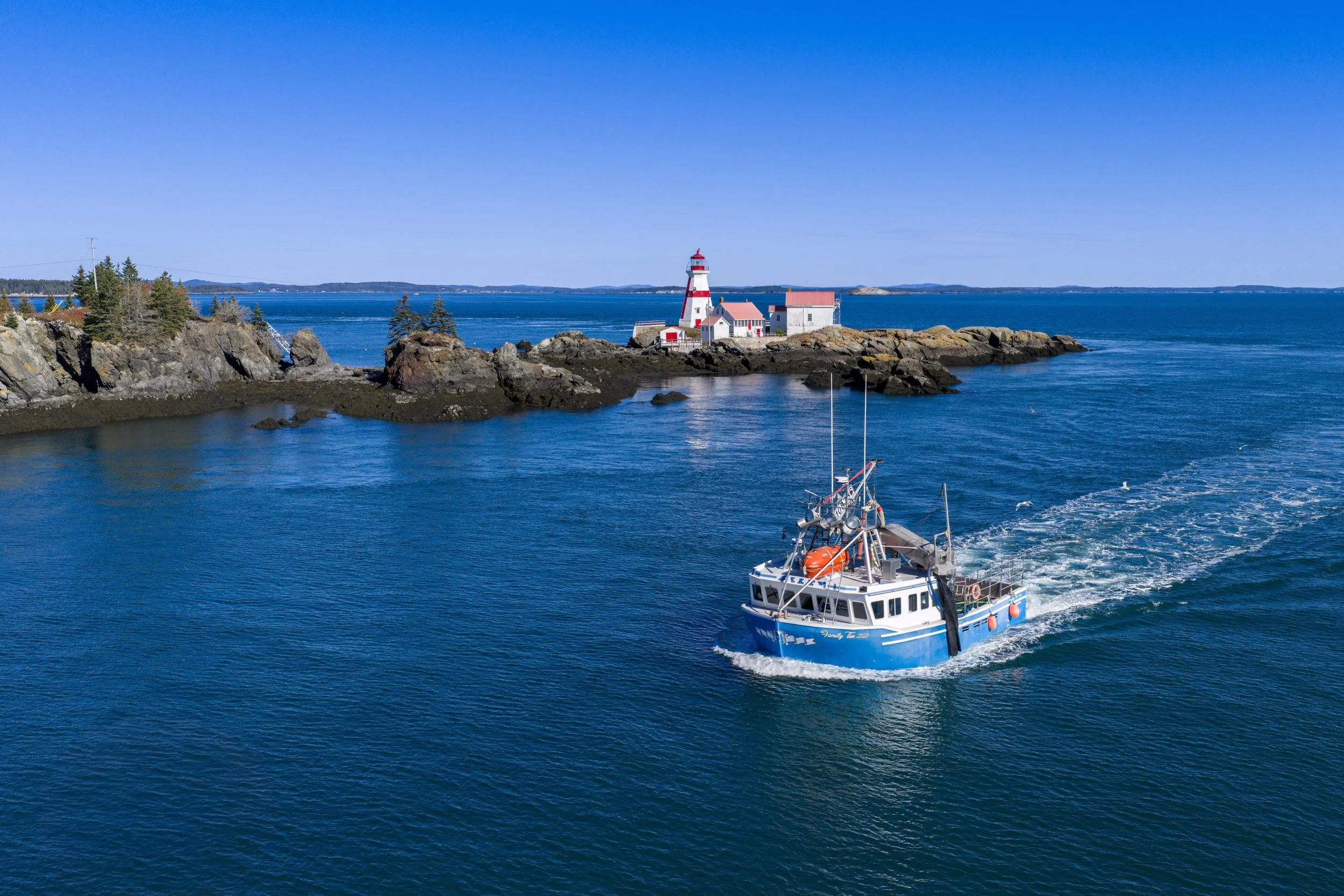lobster boat lighthouse Sam Rooney copy website.jpg