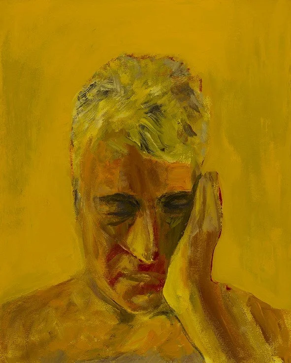 Man with hand on face.jpg