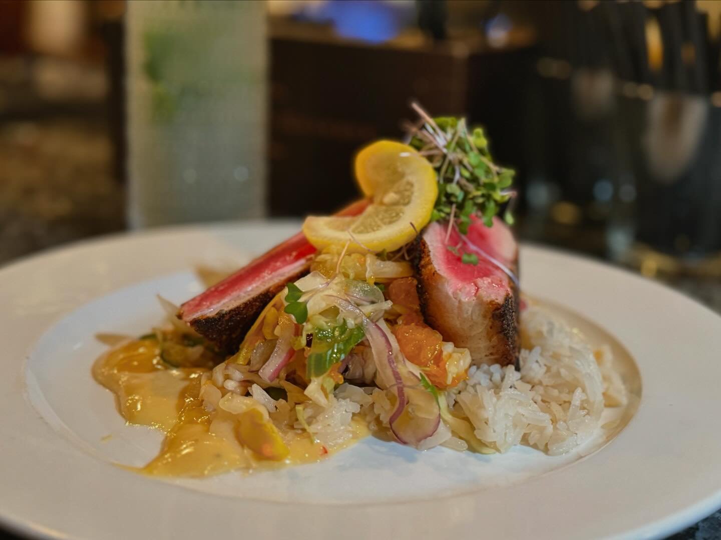 Take Mom out for dinner and let her sleep in tomorrow morning!  Cajun seared tuna on special with sesame rice, ginger aioli, and mandarin slaw.