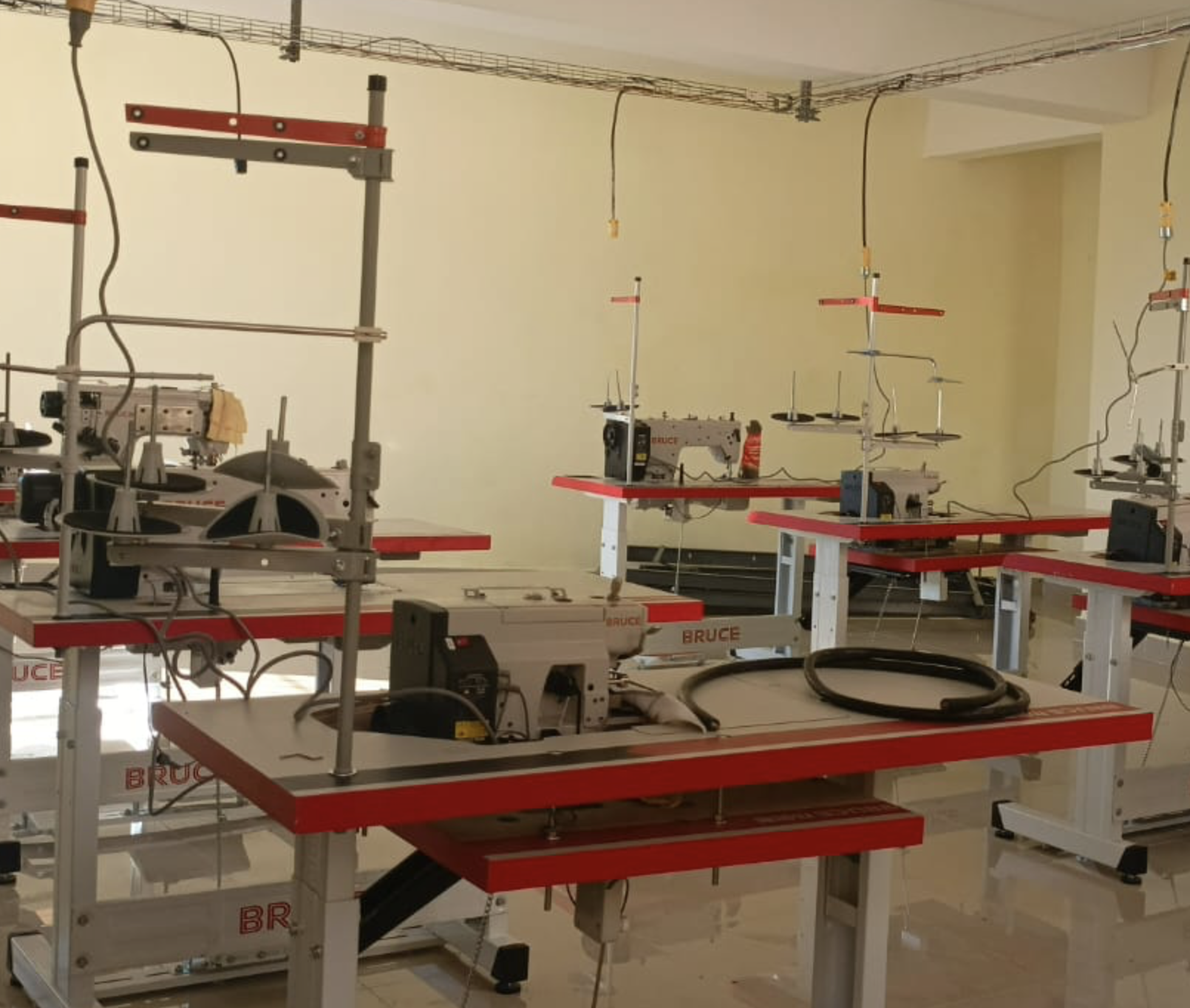 Cutting the First Patterns: The T-Shirt Factory Moves One Step Closer to Opening