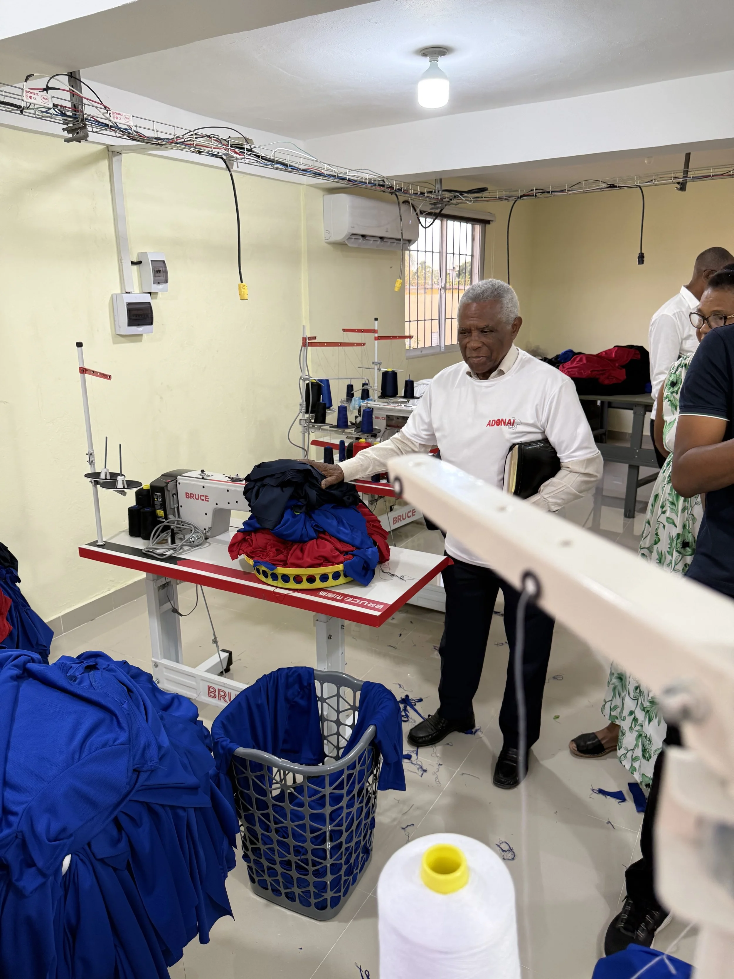 Pastor Marino at the grand opening of the new T-Shirt Factory.