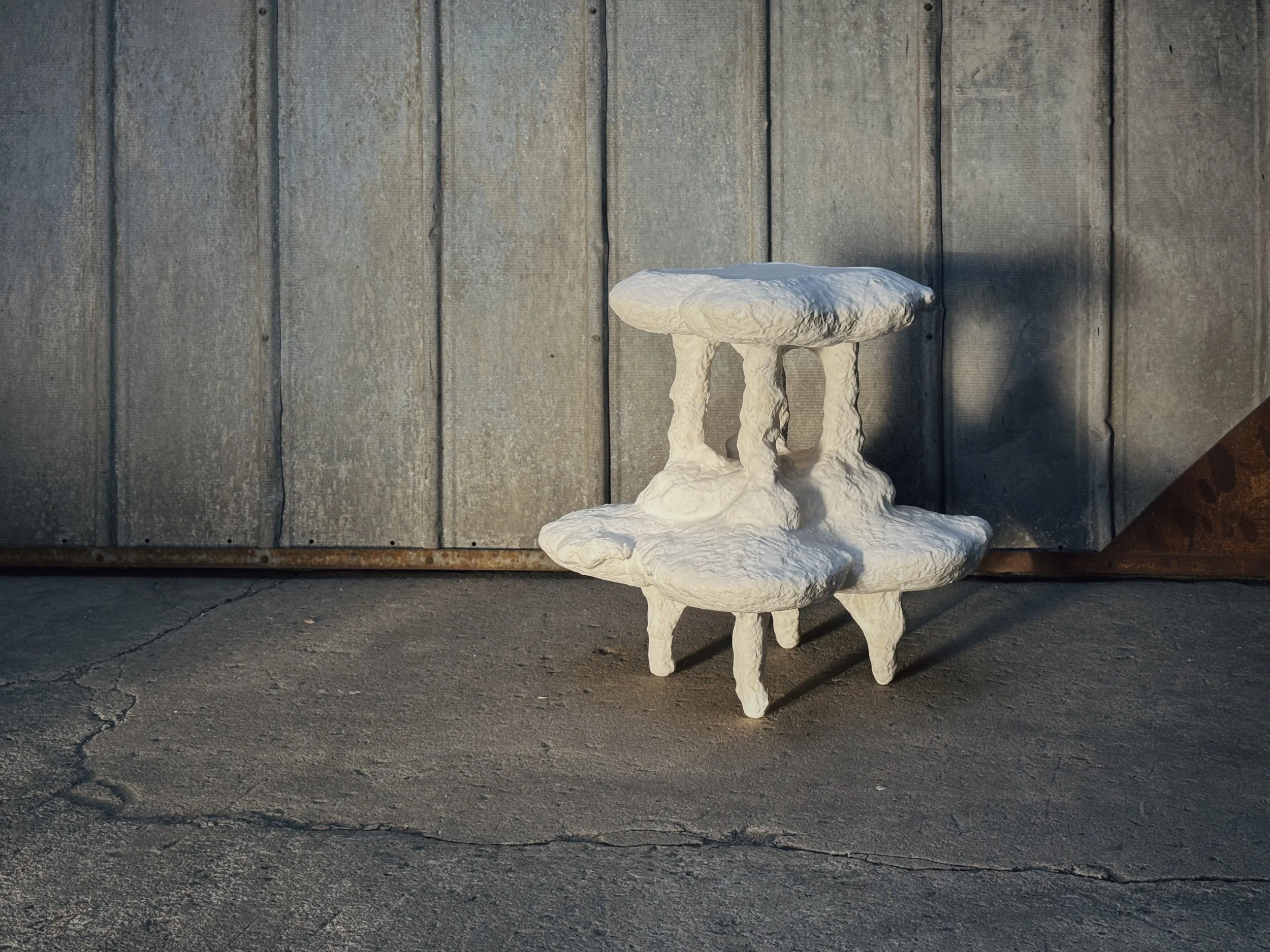 gypsum, steel side table, MONO series, mineral glaze by artists Krislyn Komarov and James Benn, O.M. Studio, Los Angeles
