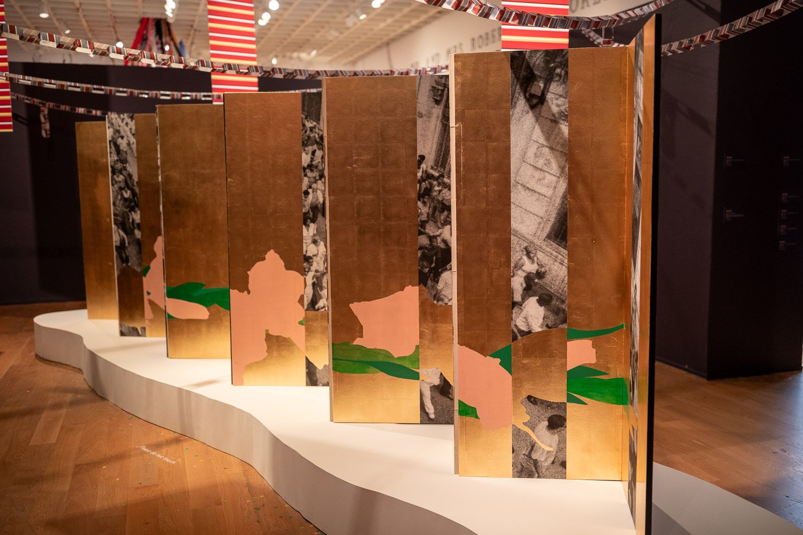  Francisco Masó  (b. Havana, Cuba, 1988)  The Coronation of the Gladiolus  2026  Paintings, folding screen, flags, paper chains, acoustic panels, sound, and musical  instruments  Dimensions Variable  Courtesy of the Artist  Photography by Laura Serdi
