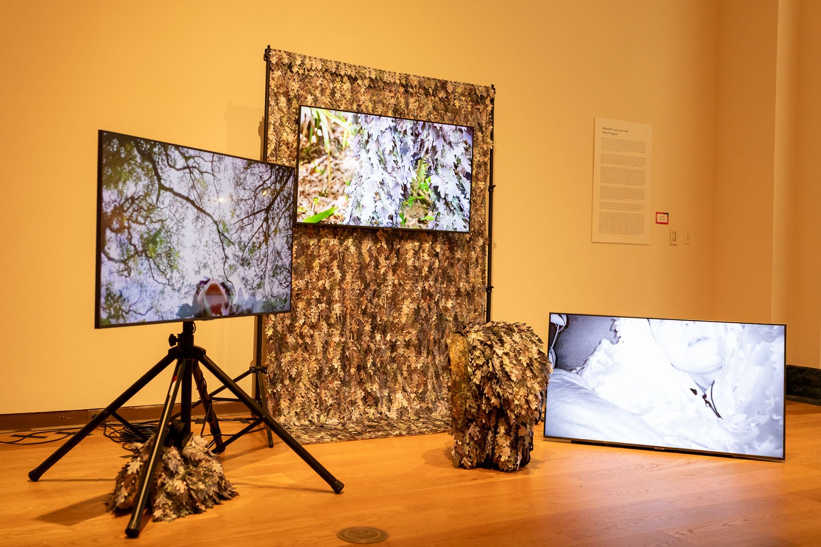  Meredith Laura Lynn and Katie Hargrave  (b. Boston, MA, 1984)  (b. Chicago, IL, 1985)  Bad Outdoorsmen (Application Video) (Northeast Florida) (Vignette 1)  2024  5 channel video with sculptural elements including lasercut polysilk textiles and  pho
