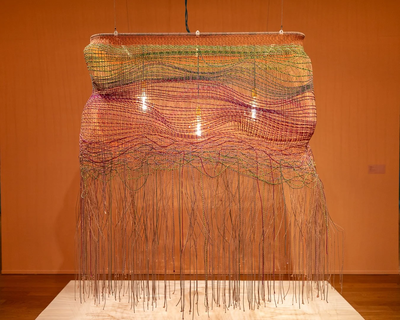  Jessy Nite  (b. Montclair, NJ, 1985)  LANDS END  2026  Hanging textile light work  90 x 68 x 48 in.  Courtesy of the Artist  Photography by Laura Serdiuk, Women in the Arts, Inc. 