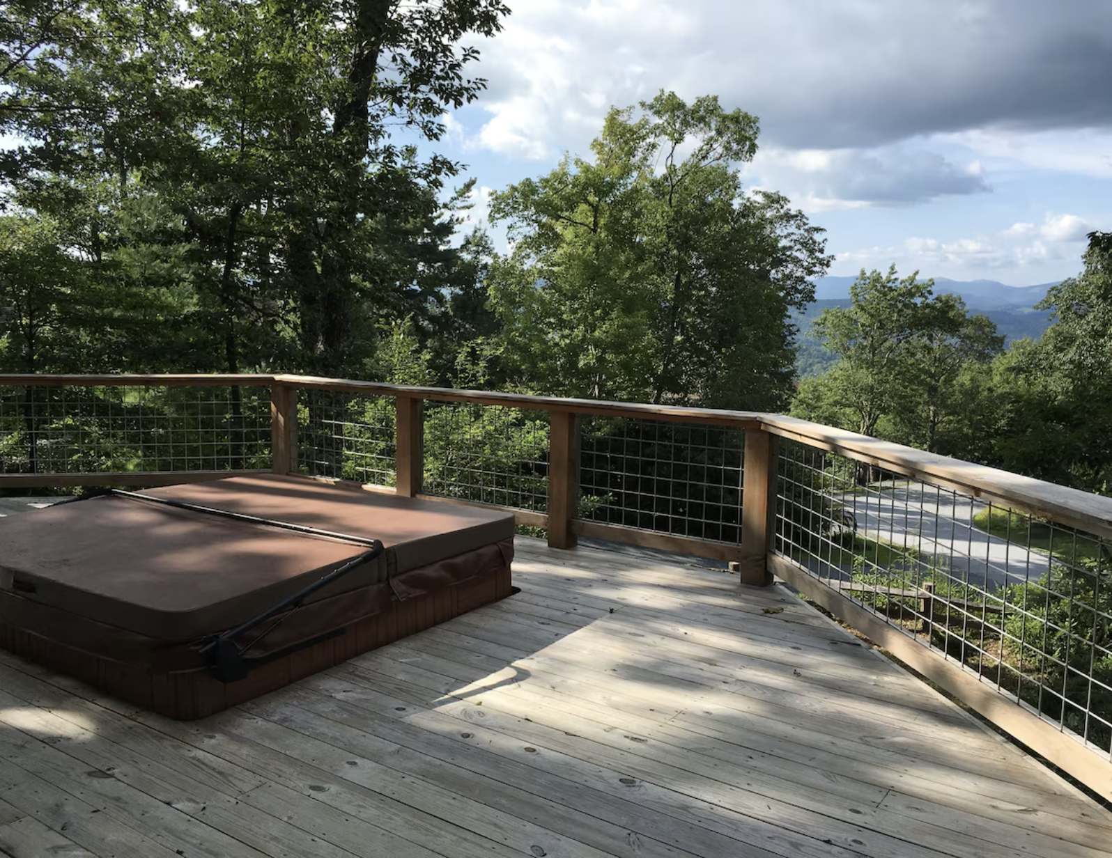 Peaceful Appalachian mountain landscape surrounding a wellness retreat for mothers and babies