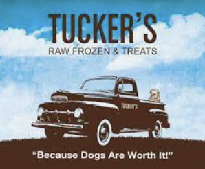 Logo for Tucker's Raw Frozen & Treats with a vintage black truck illustration and the slogan 'Because Dogs Are Worth It!'