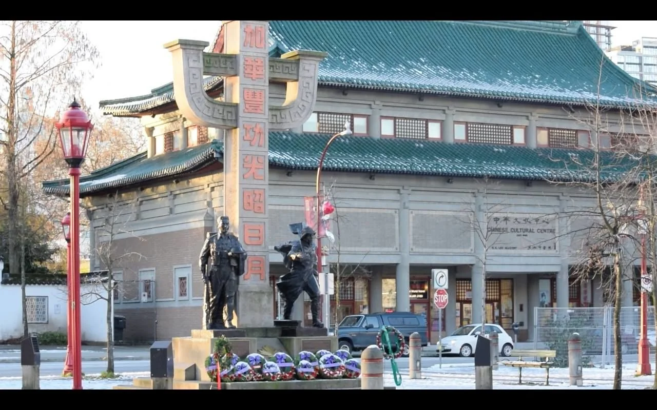 Chinatown residents rally to oppose condo beside memorial