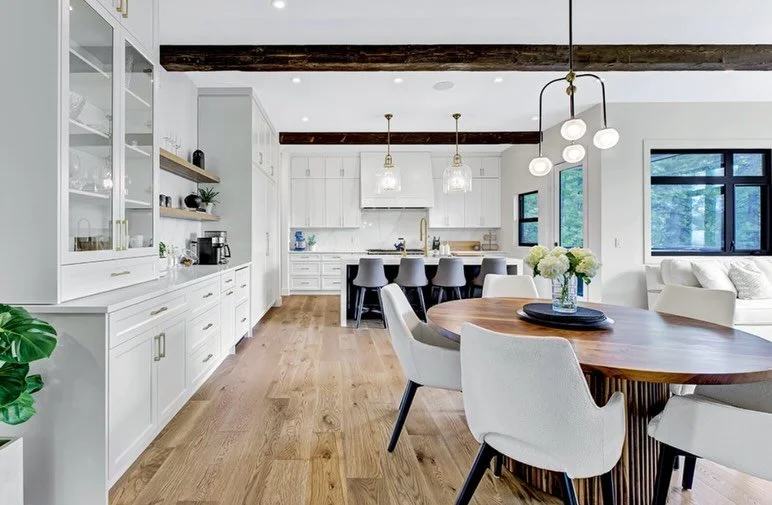 We were featured through Redline Building for the @besthomemag summer edition in 2025! We are honoured to display our Box Beam ceiling beams &amp; mantle in our Walnut standard stain on Barn Board texture for this project.