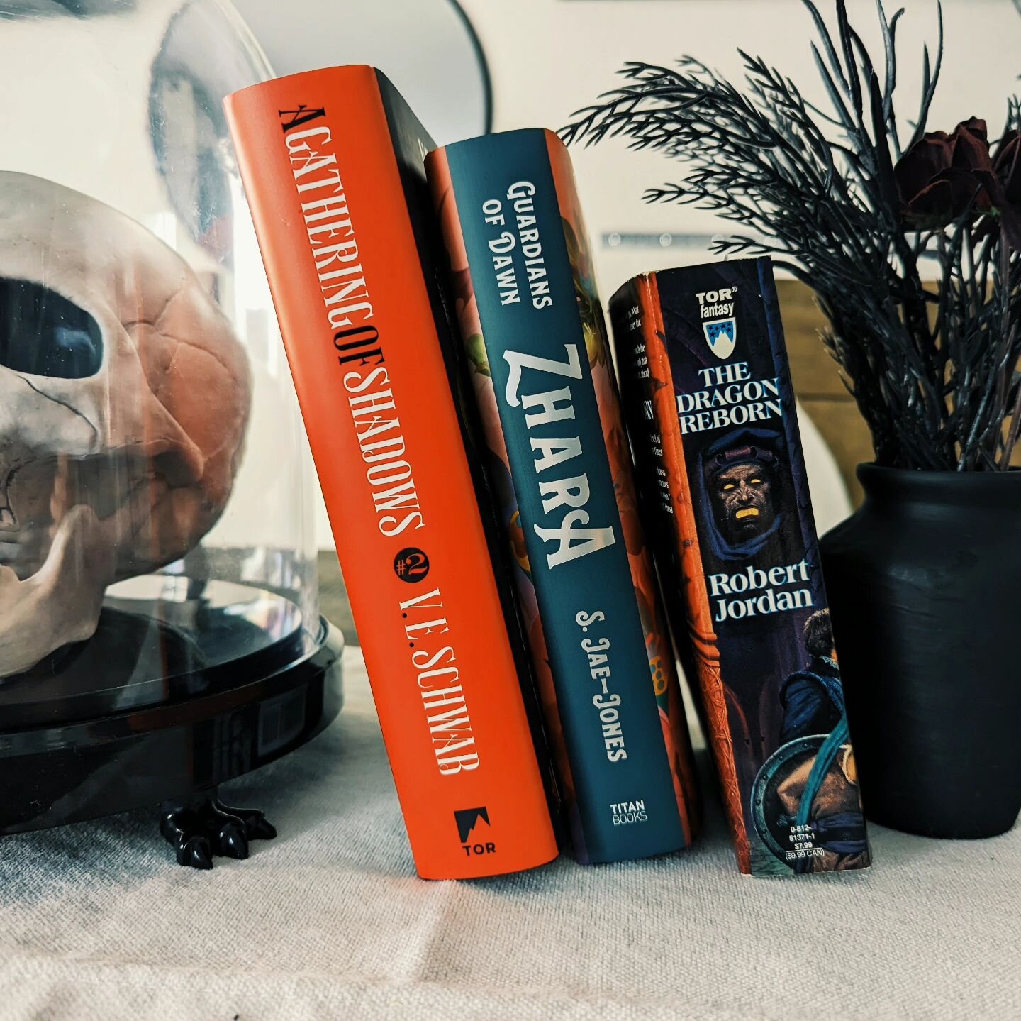 Do you prefer to read one book at a time or multiple? 

Usually I stick to one at a time, but lately I've been reading two or even three. Right now I'm reading A Gathering of Shadows in ebook, Zhara in hardcover, and The Dragon Reborn in audiobook. I
