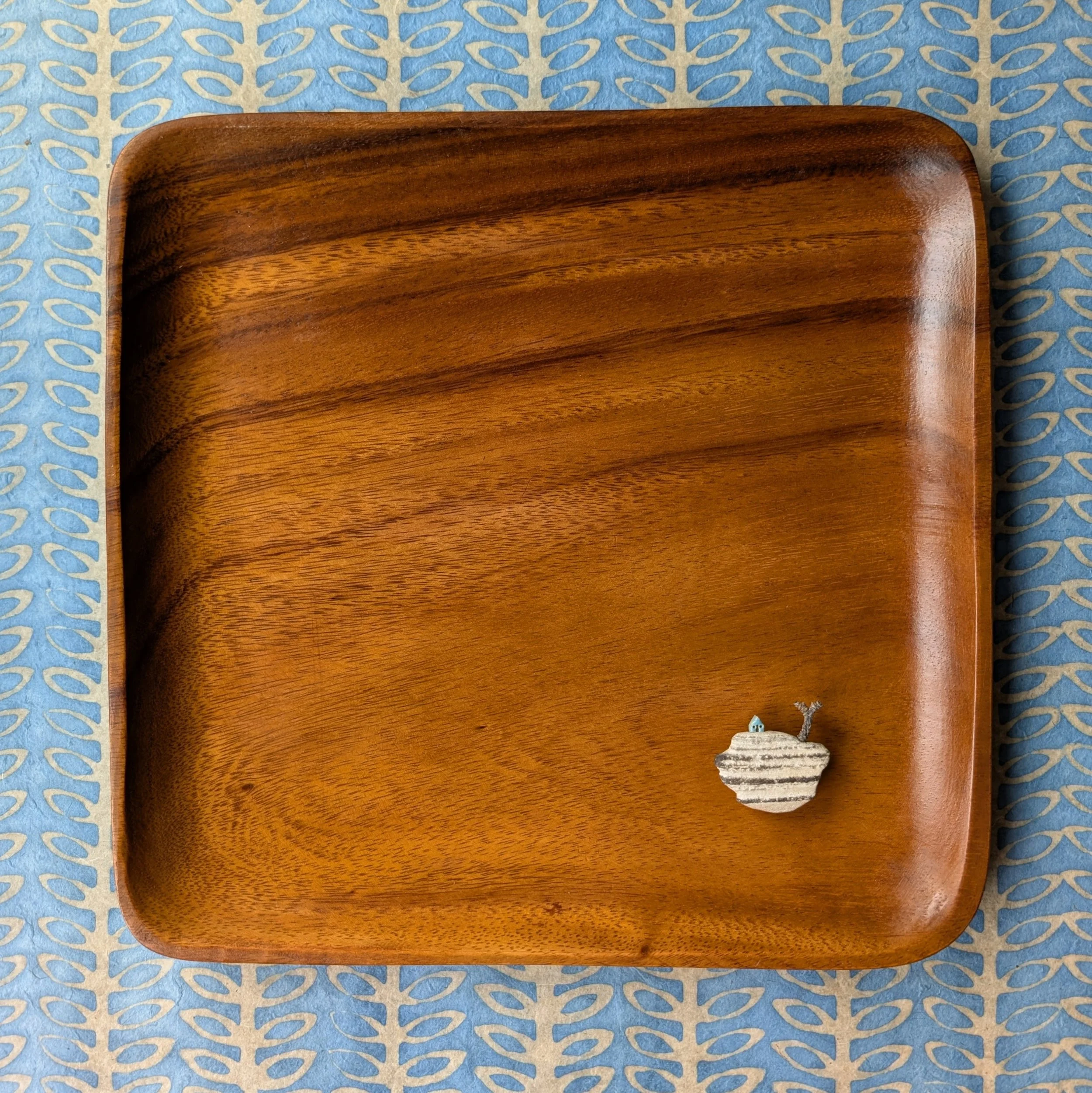 a stone endlessly in flight (11.5" x 11.5" x 1")