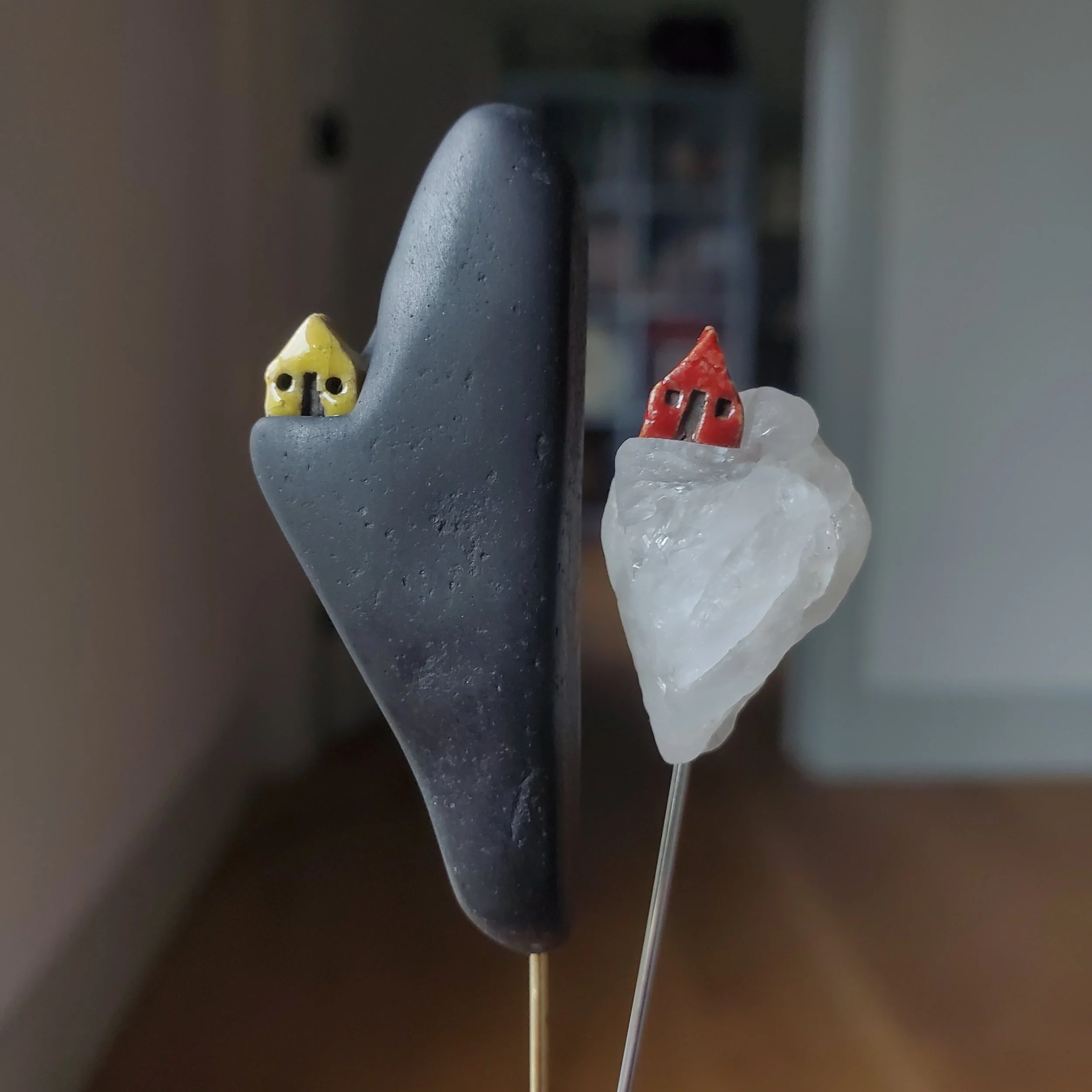 stone brooches (3" x 1" x .25")