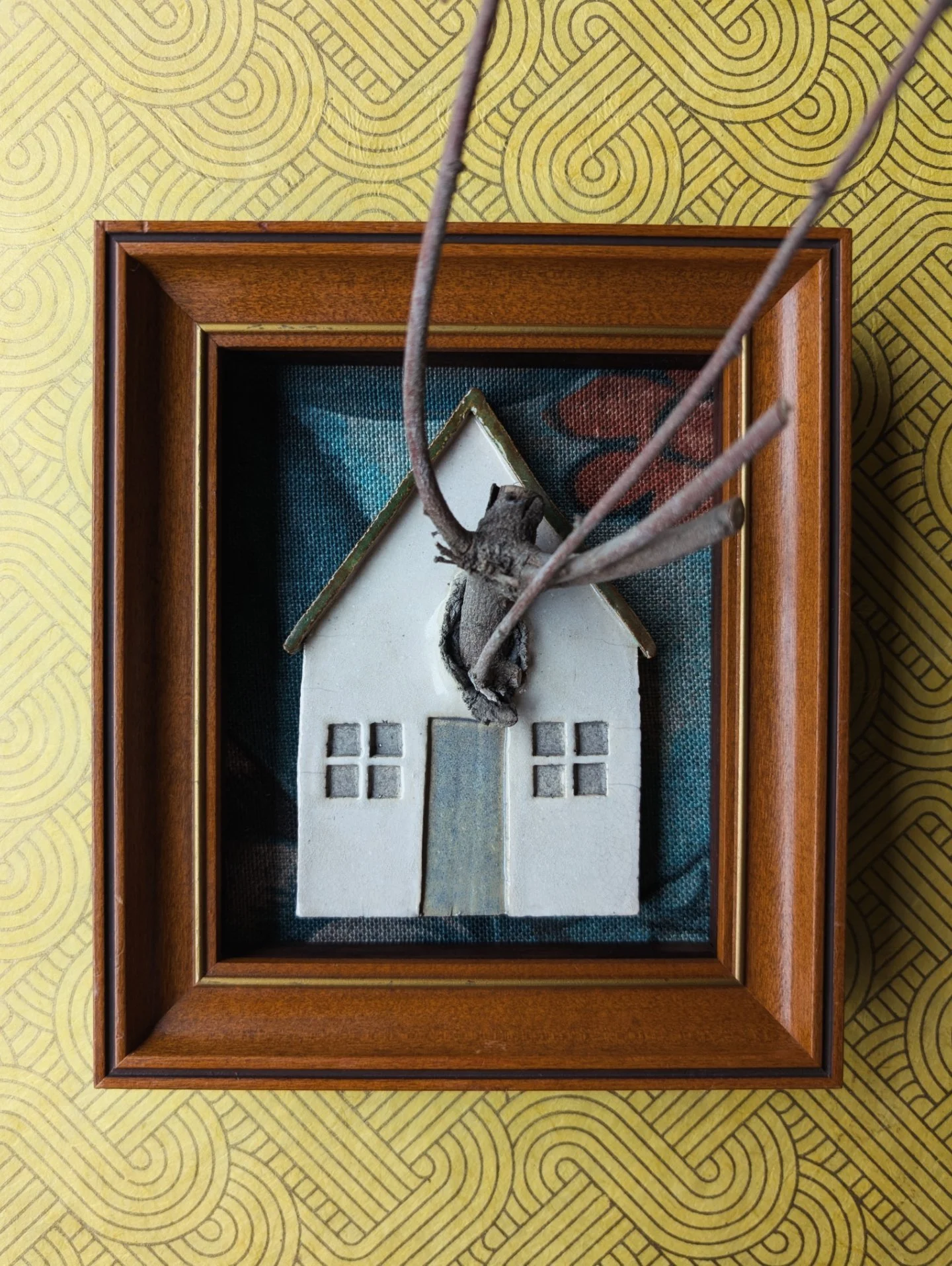 cottage pierced by barren tree (detail)