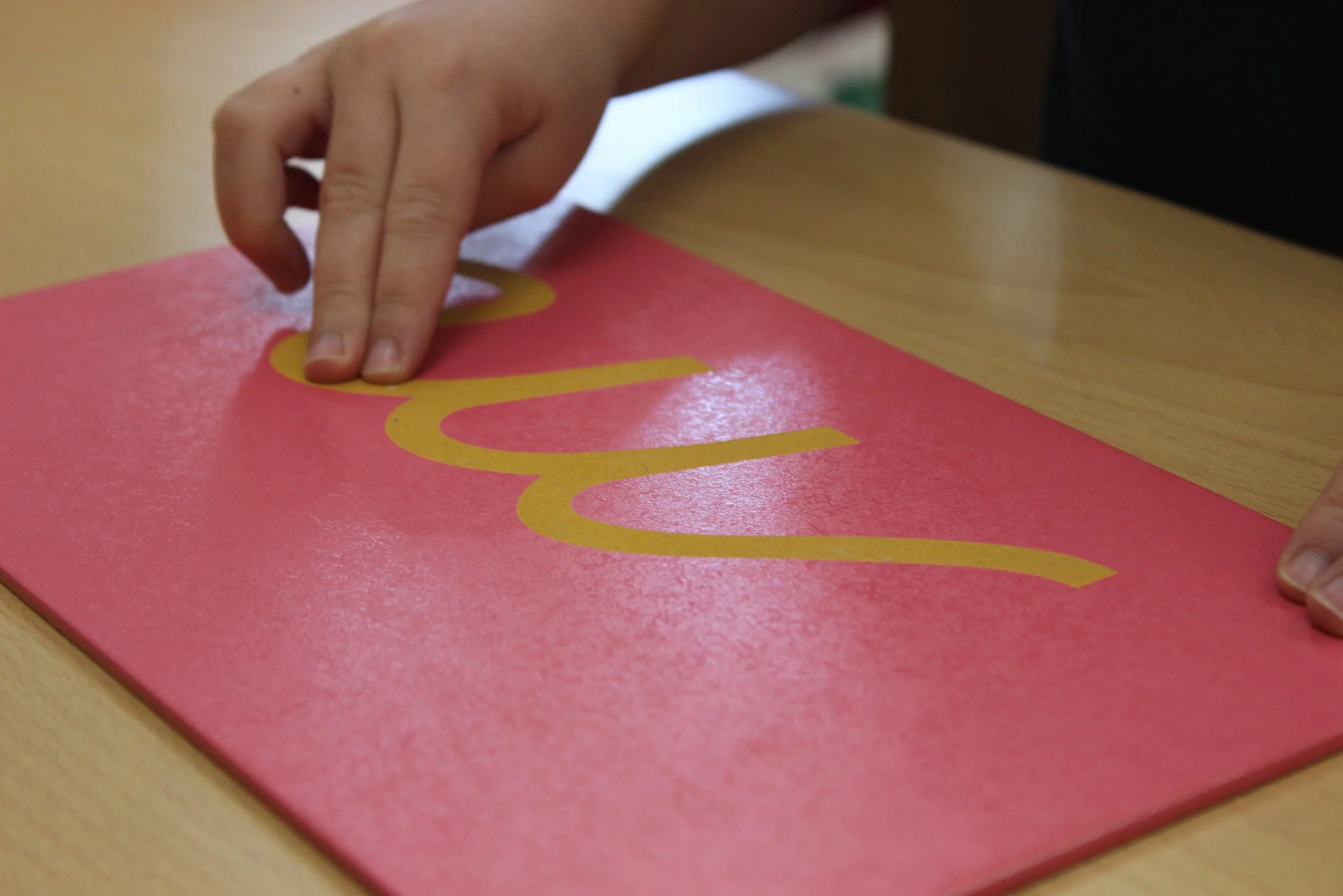 Tracing Sandpaper Letters (Year One)